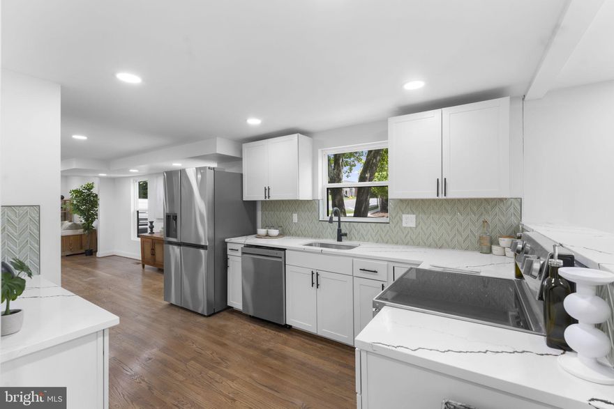 Beautiful 3 bedroom, 2.5 bath home is perfectly located and has been completely renovated from top to bottom within the last year. You will love everything about this fully upgraded home, featuring a detached garage with a spacious workshop above it, quartz countertops kitchen and bathrooms, stainless appliances, custom finishes throughout this bright and spacious home. So convenient to everything! 2 parks with playgrounds within walking distance and shopping, personal services and restaurants are on the next block. Another major shopping area in Hybla Valley, 0.5 miles down Rte. 1 South. Great area for walking/running. Elementary and high school within walking distance. Less than 4 miles to Old Town, easy access to DC, GW Parkway, beltway and Kingstowne. Additional details and photos will be added shortly. This is the one!