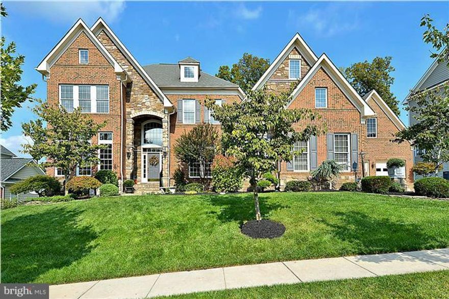 Call for appointment. VanMetre estate series.  TWO HUGE MASTER SUITES, one on main level, brzlian cherry hdwds, gourmet kitchen, every optional extension. 9,000+ sq ft incl. LOADS of finished space and MORE storage than you can fill PLUS garages for 4 cars.  Incredible exterior-patio, trex deck, lndscp lighting, sound sys, irrig sys backs to private wooded rear yard.  IT IS A PERFECT 10!!