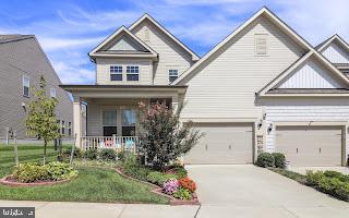 Photo of 15930 Cucumber Magnolia Way, HAYMARKET, VA 20169 (MLS # VAPW2130676)