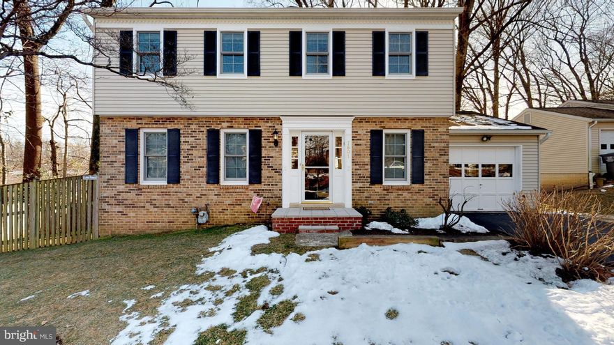 SOME OF THE PHOTOS IN THIS HOME ARE VIRTUALLY STAGED>The value of a dollar increases daily in this value-priced   5 bedroom 3.5 bath home.  Reasons to buy:1. Space...traditional floor plan with spaces in the right places. Kitchen with adjacent den complete with wood-burning fireplace opens to sunny deck.  Welcoming entry foyer, formal living and dining room plus powder room complete the main level.Upstairs you will find a large master suite with full bath plus 3 secondary bedrooms and hall bath complete the upper level. Downstairs you will find a 5th bedroom and full bathroom plus a large, sunny great room with brand new french doors leading to a private patio.  Don't miss the unfinished storage room!This is a wonderful neighborhood for sinFresh neutral paint, brand new carpeting on both main and upper levels. New vinyl  flooring in kitchen and arrival areas.  Just add furniture and enjoy the super convenient location.  Easy access to I-66, 495 Beltway, Tysons Corner, Mosaic District.