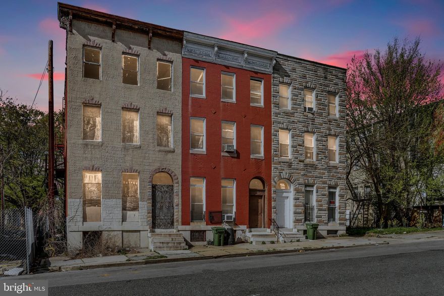 **ZONED 3-UNIT PRICE TO SELL** This Is An Easy To See Investment Property **ATTENTION** Calling All Owner Occupants With Vision and FHA 203K Renovation Financing, Investors, Developers and Community Builders. Take An Immersive 3D Virtual Reality Tour. Full Schematic Floor Plan Available - Check Photos For Floor Plans. Welcome To Historic Harlem Park. A Unique Community Designed With Several Inner Block Parks That Also Includes Historic Lafayette Square. During The Civil War The Square Was Used By The 3rd Regiment MD Veteran Volunteers as a Campground. Homes In This Area Are Mainly Three Story Rowhouses Built In The Late 1920's In Italianate Design With Classic Marble Ornaments, Spacious Rooms, Marble Fireplaces, Elegant Staircases, and Nice Backyards. Join Local Community Organizations As They Work Hard Towards The Betterment of The Historic Harlem Park Community. Now Is Your Chance To Join The Momentum of Increased Housing Development, Community Development, Community Resources, Sanitation, Education, Recreation, and Much More. This 3-Unit Property Is In Need of Full Renovation From Top To Bottom. All Cash Buyers or Those With Renovation Financing Are Warmly Welcomed. The Property Will Convey In As-Is Condition. The Seller Will Make No Repairs.  This 3-Unit Property Is In Need of Full Renovation From Top To Bottom. Calling All Owner Occupants With Vision and 203K Renovation Financing, Investors, Developers and Community Builders. Some Photos Are Representative of a Future Renovated Area.