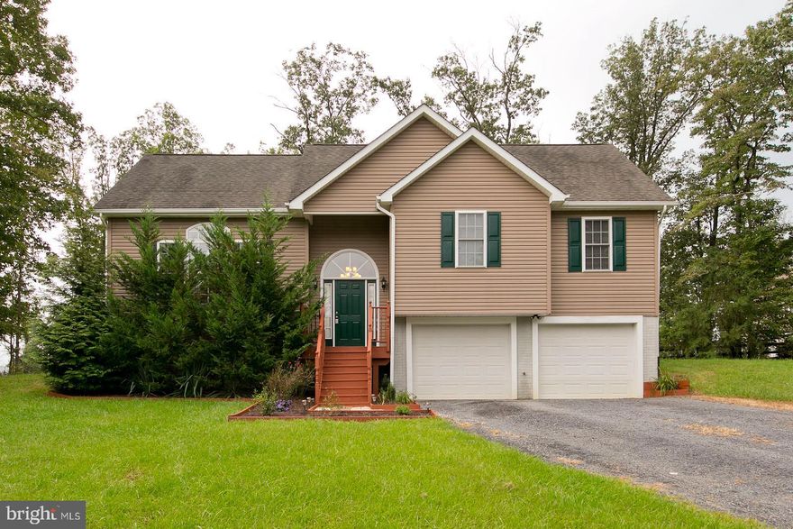 This is the one!  Beautiful 3 BR, 3 full bath home situated on over an acre of land with seasonal mountain and river views.  From the moment you enter you'll notice how meticulous this home has been cared for.  Uniquely  designed floor plan with 12' ceilings in the LR then 9' ceilings throughout main floor.  Coffered ceilings in the primary bedroom with full bath and huge walk-in closet. Finished lower level includes a family room and the third full bath.  Check out the storage area underneath the LR! Tens of thousands of dollars in recent upgrades and improvements! New top of the line Trane HVAC system  with air purifier and humidifier.  New upgraded refrigerator, new well pump and tank, newer carpet and more.  COMCAST available!! Best of all this home is within minutes of the National Forest walking trails.