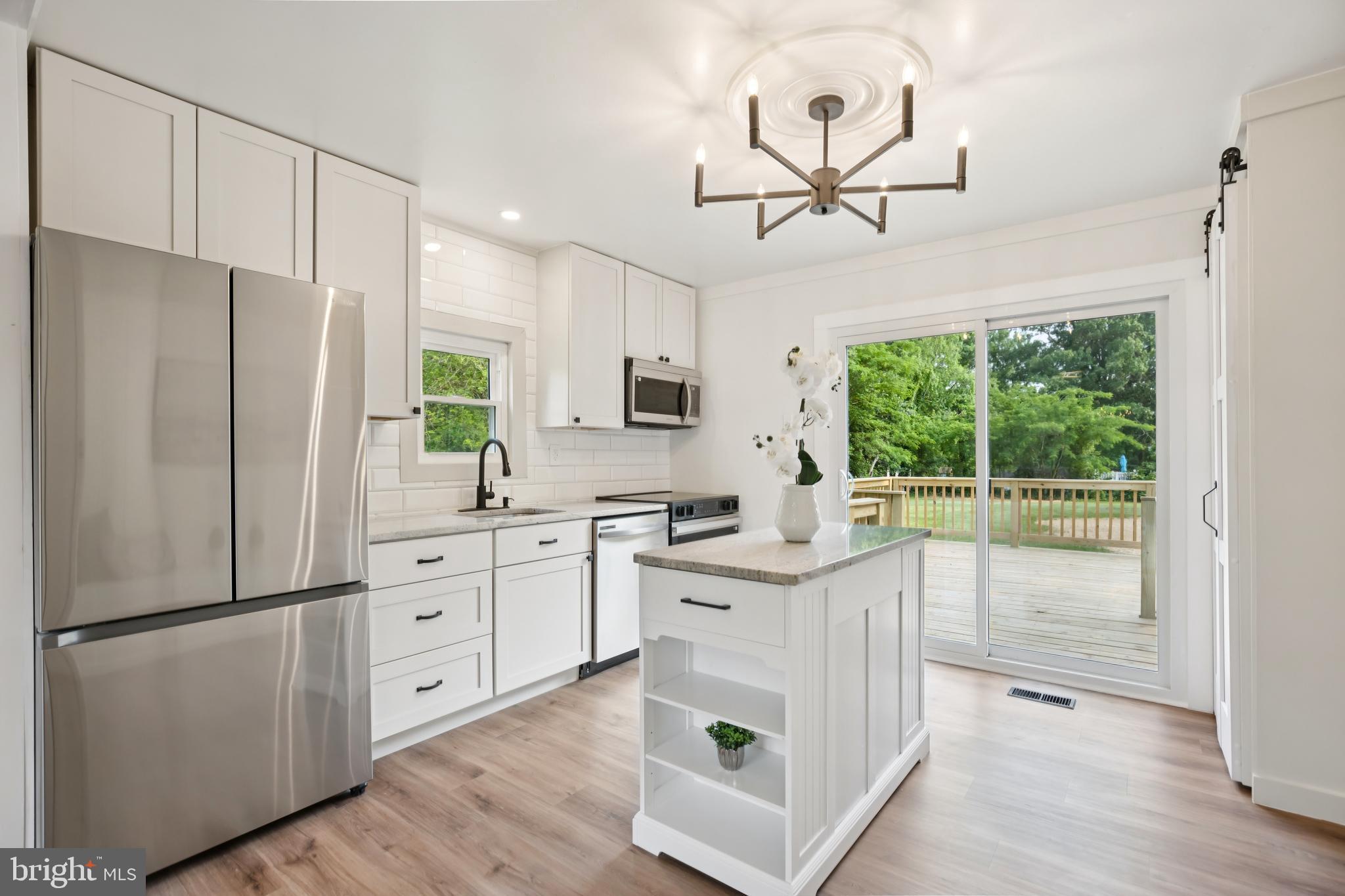 Fully Renovated | 1 Acre | No HOA | Energy-Efficient Upgrades
Welcome to 27136 Dogwood Lane — a beautifully reimagined 4-bedroom, 2-bathroom home nestled on a quiet 1-acre lot in the established community of Beverly Estates. From the moment you arrive, you’ll notice the fresh new siding, roof, and windows, setting the tone for the thoughtful renovation throughout.
Step inside to discover an open, sun-drenched layout with all-new luxury vinyl plank flooring, modern lighting, and a fully updated kitchen featuring granite countertops, stainless steel appliances, and sleek cabinetry — perfect for entertaining or everyday living.
Downstairs, a finished walk-out lower level offers flexibility — ideal as a cozy den, home office, or guest space — complete with a charming wood stove for those chilly Maryland evenings.
Key features include:
Brand new roof, siding, and energy-efficient windows
Fully updated kitchen and bathrooms
New complete Septic System and Well filtration system
No HOA — bring your boat, RV, or chickens!
Ample parking and usable flat yard space for gatherings or gardening
1-acre lot with mature trees and privacy
Located minutes from shopping, dining, and commuter routes — this is the turnkey home you’ve been waiting for in Mechanicsville .
Move in and make memories — there’s nothing left to do but unpack.