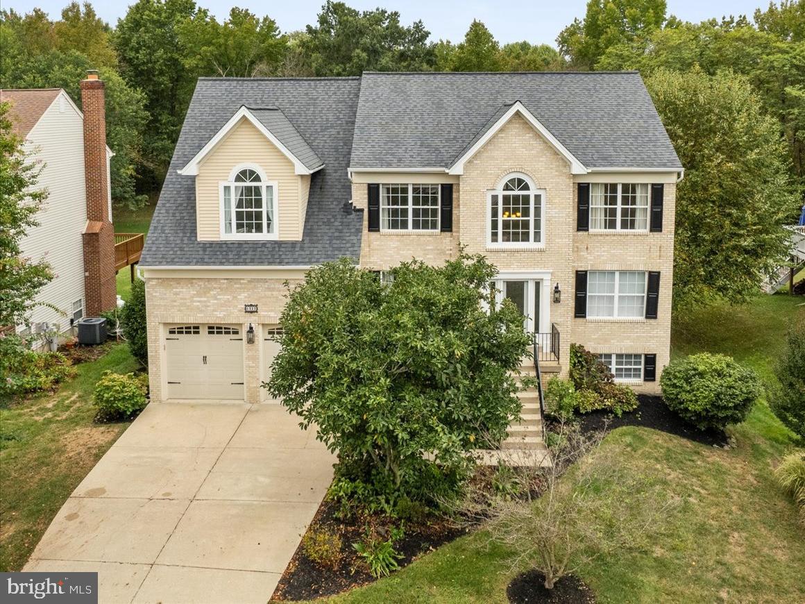 Welcome to this Stunning home with gorgeous living spaces in a coveted water access community!
This property offers ample opportunities to spread out and take advantage of the wide-open living area. This home boast 5 bedrooms, 3 ½ baths, an office/den, formal living and dining, family room, eat in kitchen and fully finished basement. In addition, you can enjoy an amazing outdoor living experience year round on the custom¬ built screened porch, overlooking the expansive back yard. The family room with its soaring ceilings, abundant natural light and fireplace, is a favorite gathering spot for friends and family. The beautiful kitchen offers ample cabinetry, double wall ovens, granite countertops and an awesome view of the backyard from the kitchen sink. The main level living includes formal dining room, formal living, office/den, and beautiful screened porch. Oak stairs with wrought iron balusters lead the way upstairs where you will find the spacious primary suite which includes a sitting area, two primary closets and will not disappoint if it is space, you are looking for. The updated primary ensuite is a gorgeous space, it’s luxurious and full of light. Enjoy a leisurely soak I the stand alone tub while sipping a refreshment from the nearby beverage center. Three additional bedrooms and full bath complete this level with hallway overlooking the 2 story family room. The lower level/basement offers a spacious living area with natural light, a bedroom and full bathroom. There is also a full bar counter for entertaining and an abundant storage room. Enjoy the patio off of the lower level with ease of access to the screened porch. This well-maintained home located in a water access community where you can explore the tranquil walking path that leads to the community pier and enjoy the view. All of this within an easy commute to AAFB, Annapolis, Washington DC and Baltimore.