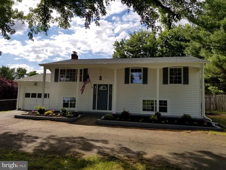 Beautifully renovated home on quiet level one acre lot, brand new paint inside &out, new carpets, updated kitchen w/ granite counters, stainless steel appliances. Renovated baths. Finished w/o basement w/ full bath, bedroom &rec. room. Newer water heater, 2 zone heating & a/c. Fenced rear yard. 2 sheds, Real nice deck half covered ready for relaxing! 2 miles to MARC commuter train. Real Nice Home!