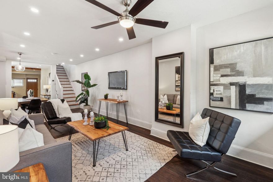 Make your home in Fairmount’s lovely Art Museum area in this two-bedroom, one-bathroom home featuring generous outdoor space and an expansive layout, including a bonus room/office and a full basement.

At this roomy home, you’re greeted by a cheery front garden and a sunny east-facing porch perfect for morning coffee overlooking the tree-lined street. Inside, the open living/dining room boasts new hardwood flooring and an expansive footprint for relaxing and entertaining beneath a ceiling fan and charming chandelier. Ahead, the oversized eat-in kitchen delivers abundant storage and seating alongside a full complement of appliances, including a gas range and dishwasher. Outside, your private backyard sets the stage for al fresco dining and gameday gatherings.

Head upstairs to explore two sizable bedrooms with roomy floor-to-ceiling closets. The beautifully renovated windowed bathroom impresses with a large benched steam shower featuring a rain showerhead and hand sprayer, a custom wood vanity, and a modern two-stage commode. An extra-large cedar closet adds more storage to this level, while the windowed bonus room provides the ideal setting for a home office, nursery, or fitness space. In the unfinished basement, you’ll find a washer-dryer, storage space, and room to grow.

Located where Fairmount meets Brewerytown, this home is surrounded by Philadelphia’s fantastic attractions and amenities. Take in world-class art at the city’s best museums, and enjoy waterfront outdoor space and recreation at sprawling Fairmount Park and the Schuylkill Banks trails. The nearby blocks are lined with cozy dining and nightlife destinations, with the conveniences of Center City within easy reach. Transportation is effortless with the SEPTA Route 15 trolley right outside your door and excellent bus service nearby.