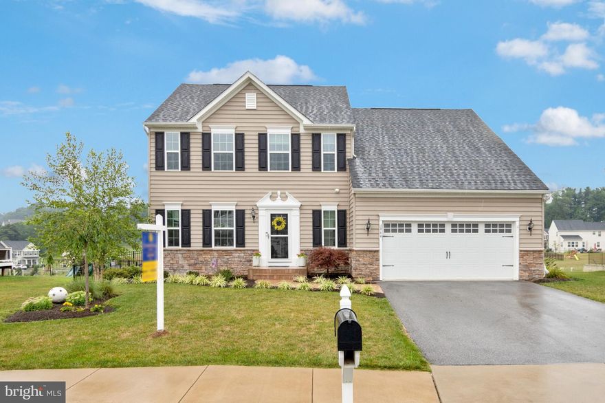 Gorgeous 5 year old home, with every imaginable upgrade.  This 5 bedroom, 4.5 bath home, is fabulous on 3 finished levels of living space.  The main level features a living room with fireplace and 1 year old engineered hard wood flooring, amazing gourmet kitchen with island/granite/stainless appliances/pantry/updated cabinetry/hardwood floors, dining area with windows overlooking beautiful yard, family room with fireplace, and 1st floor bedroom/full bath. Master bedroom suite is spacious and bright, and 3 additional upper level bedrooms large. Lower level family room has been beautifully finished by sellers. Work out room features rubber matted flooring and a full bath has been added. In addition to the fabulous basement, sellers have invested in water filtration system,  water softener, osmosis system, whole house humidifier, storage room over the garage, engineered hard wood flooring, 900 sq ft brick patio,  fencing of rear yard, and updates of all cabinetry and fixtures. Sellers lease solar panels and will share all information. All of the work has been done! Your only job is to move in and enjoy this exceptional home. PLEASE: see sellers list of upgrades and improvements in computer under Documents. Buyer must be willing and able to take over lease for solar panels: $205 per month.