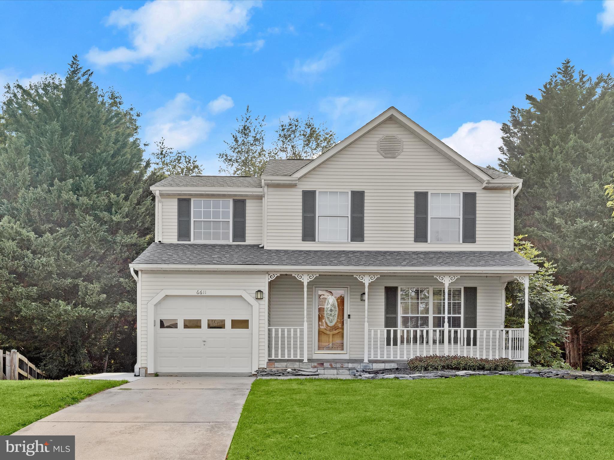 Discover comfortable living in this beautifully updated 5-bedroom, 3.5-bath home, tucked away on a peaceful cul-de-sac in the desirable Robin Meadows community.
A charming covered front porch sets the tone for this inviting home, where a soft neutral color palette, luxury vinyl plank flooring, crown molding, and chair rail details create a warm and elevated main living space. The sunlit living room transitions effortlessly into the expansive eat-in kitchen, designed for both function and style. Here, you’ll find vaulted ceilings, granite countertops, stainless steel appliances, 42" soft-close cabinetry, and a designer tile backsplash—perfectly complemented by a breakfast bar and adjacent dining area, ideal for casual meals or entertaining.
At the heart of the home, the spacious family room features a soaring cathedral ceiling and a stone-surround wood-burning fireplace that brings a cozy, rustic touch to the modern layout. Glass doors lead to a tiered deck, offering the perfect setting for outdoor dining, gatherings, or simply enjoying the wooded views and mature trees that surround the property.
A stylish powder room completes the main level. Upstairs, the airy primary suite boasts another vaulted ceiling, a large walk-in closet, and a private bath with a ceramic tile step-in shower. Three additional bedrooms and a full hall bath provide ample space for family or guests.
The lower level adds even more versatility, with a generous recreation room, a fifth bedroom, a third full bath, and dedicated laundry facilities ideal for extended stays, multi-generational living, or work-from-home flexibility.
Offering an unbeatable combination of space, updates, and location, this home is a standout opportunity in Robin Meadows.
Note: Select interior photos have been virtually staged.