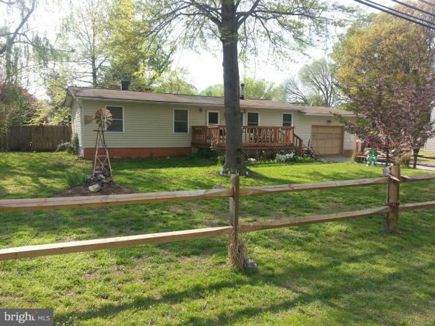 Nice Starter Home.  Large One Car Garage for the mechanic, Nice screen room perfect for crabs, nice level lot, additional room that could be used as a bedroom, familyroom, office.  Septic has been upgraded to the new septic tank, front and back deck.  Your Personal touch is all it needs.  Roof and windows have been updated, well replaced, Great place to start.