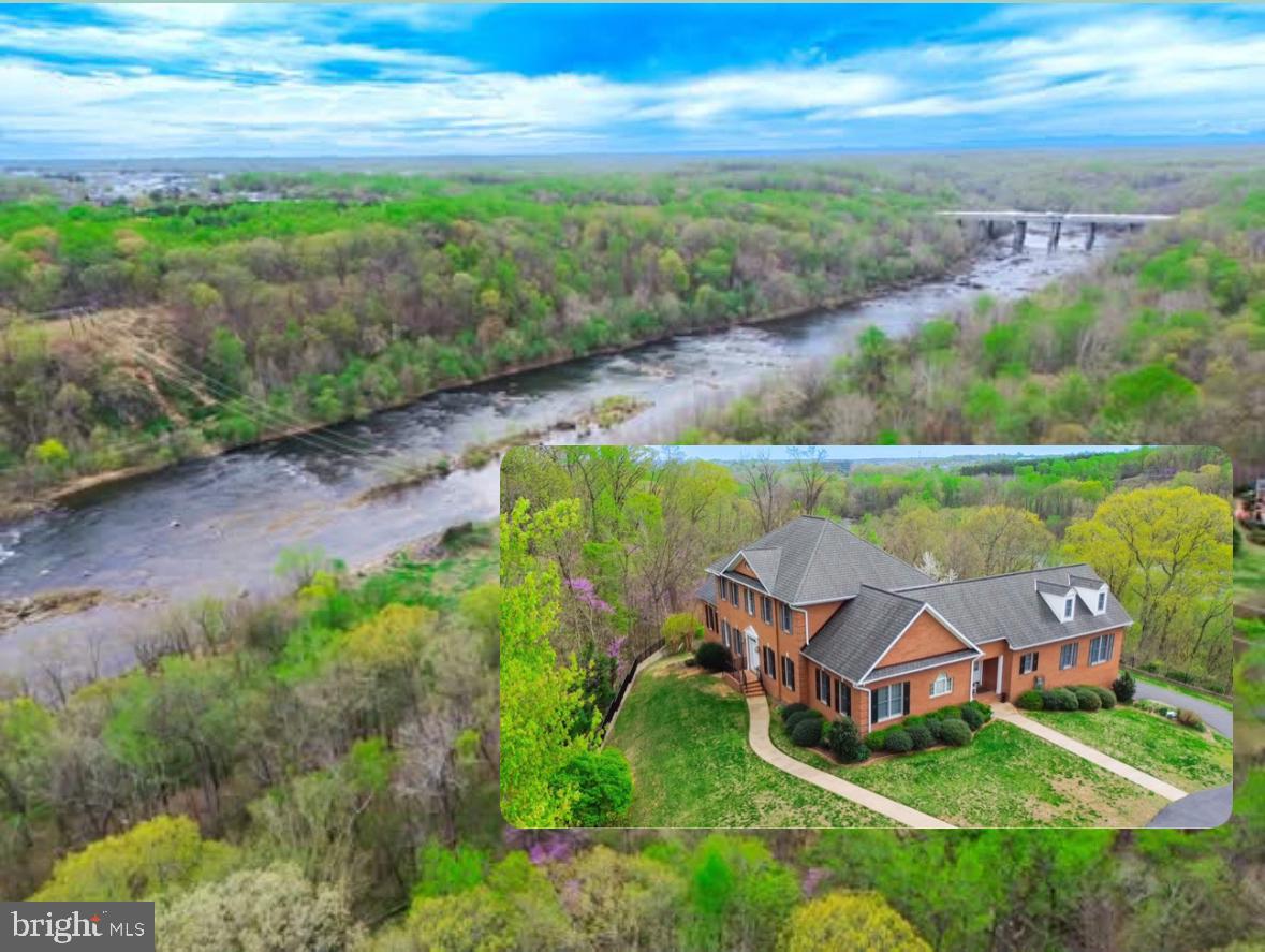 Discover an extraordinary home along the Rappahannock River, nestled within a serene 3.5-acre private sanctuary. Designed by the award-winning architect William Poole, this stunning residence encompasses over 7,000 square feet of opulent living space, featuring exceptionally large rooms and meticulous custom details.
Upon entering, you will be greeted by soaring 10-foot ceilings on the main floor, creating an airy and inviting atmosphere enhanced by a solid oak staircase and two cozy gas fireplaces. The main level boasts two luxurious primary suites, both offering breathtaking river views and unparalleled convenience for ultimate relaxation. Extensive millwork throughout the interior highlights the craftsmanship, with triple crown molding, chair rails, and oversized casings adding elegance. Built-in bookcases in the study, family room, and living room provide both sophistication and functionality. The open kitchen, designed for entertaining, features an eat-in area, a walk-in pantry, and a peninsula island equipped with a separate sink and breakfast bar. Upstairs, you will find a third primary suite alongside two additional well-appointed bedrooms and a versatile hobby or rec room that can be used as an extra bedroom. Tile floors and solid oak staircases combined with hardwood throughout add warmth and charm. The expansive floor plan offers numerous options for privacy and multi-generational living.
The home includes a two-car garage with a basement entrance, a full basement, and a separate workshop—ample space for storage or hobbies.
Step outside to the spacious brick terrace, complete with an awning that overlooks the Rappahannock River, making it ideal for outdoor entertaining. This picturesque setting presents opportunities for fishing, canoeing, and kayaking on the longest free-flowing river on the East Coast.
Designed for low-maintenance living, the all-brick exterior and flip-clean gutters let you savor a tranquil waterfront lifestyle without the hassle. Architectural details such as bullnose treads on the exterior brick steps, bonded jack arches over the windows, and brick quoins on the facade enhance the home's timeless appeal.
Energy efficiency is prioritized with Andersen windows and doors, four separate HVAC systems, and distinct zones to ensure year-round comfort. Enjoy modern conveniences such as high-speed internet and cable TV while relishing the privacy of this enchanting homesite.
Entertainment options abound on the brick terrace, where you can take in stunning views of the historic Rappahannock River and the scenic John Warner Rapids, along with abundant outdoor activity opportunities.
Don’t miss this unique opportunity—contact us today for a private showing and experience the luxury of riverfront living at its finest!