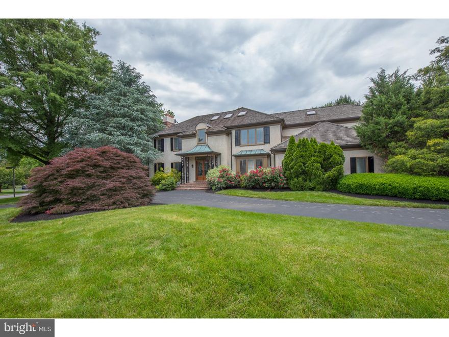 In 1978, Ravenscliff, the renowned estate of William Coxe Wright and Charlotte Dorrance Wright was transformed into the communities of Ravenscliff and Roundhill. The Duck Ponds and hillsides that frame the property along Darby-Paoli and Brooke Roads preserve the extraordinary vista that passersby enjoy daily.  223 Ravenscliff is an exceptional home in this notable, single-entrance Radnor Township community. This custom French Manor home has been beautifully maintained by its current owners and offers generously sized rooms for grand entertaining or casual living. The welcoming marble foyer opens to a large Living Room with marble fireplace and Dining Room The stunning kitchen was remodeled in 2006 and features top of the line appliances, Wolf, Sub-Zero, and Bosch. The large fireside Family Room with a handsome wood beamed cathedral ceiling sits right off the kitchen.  A Sun Room with coffered ceiling leads out to a large deck for outside dining. In 2008 a major renovation of the 2nd floor incorporated another bedroom, bathroom, office and laundry room.  A huge Master Bedroom with a marble fireplace is a retreat all its own. 2 other large bedrooms and a hall bath complete the 2nd floor.  The walkout lower level with 3 sets of sliding glass doors offers endless opportunity for recreation, in-law living or gym.  This home has 4 zones for HVAC, backup generator, central vac, copper gutters, 3 car garage, too many amenities to list.  Ravenscliff is only 5 mins to the charming village of Wayne, neighbors the Willows and Chanticler, easy access to major routes and Philadelphia International Airport, close to many country clubs and offers award winning Radnor Township Schools. This gracious home has it all!