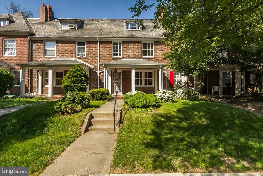 Lovely porch front Brick home in popular Oakenshawe featuring  5 bedrooms, 2 full baths and Spectacular Hardwood floors. Freshly painted and thoroughly cleaned, it shows beautifully. Detached garage offers one parking space with additional storage.Kitchen has loads of cabinets and pantry space. Close to JHU, restaurants, shops & public transportation. Great rental potential as well.