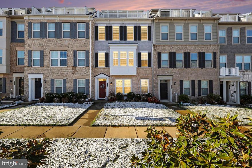 Beautifully Refinished Townhome in Potomac Shores with Rooftop Terrace & Potomac River Views

Welcome to this beautifully updated and meticulously maintained townhome in sought-after Potomac Shores, where thoughtful upgrades, elegant finishes, and an incredible location come together to create a truly exceptional home. The seller has recently made a significant financial investment to prepare this home for its next owners, including fresh interior paint and the addition of a brand-new main-level powder room, ensuring it is truly move-in ready.

The showstopping 4th-level rooftop terrace offers Potomac River views and features both a gas hookup for a grill or outdoor heater and a convenient hose bib, making outdoor cooking, entertaining, and terrace maintenance easy and enjoyable. Just inside, an open bonus room with a wet bar rough-in makes this top level an entertainer’s dream.

Inside the home, you’ll immediately notice the hardwood floors throughout, plantation shutters, upgraded lighting and ceiling fans, and a fresh interior paint completed in 2026, creating a bright, modern, move-in-ready feel throughout.

The kitchen is beautifully appointed with a large center island, wall oven/microwave combo, oversized cooktop, walk-in pantry with upgraded storage, and abundant cabinetry including extra space perfect for a buffet area or coffee bar. A new refrigerator (2024) completes the space.

The entry level offers a spacious and versatile living area that can function as a home office, lounge, or flexible entertaining space, along with a brand-new powder room added in 2026. This level also provides access to the oversized two-car garage, featuring finished walls and a textured finished floor, along with a garage door opener system with backup battery and new rails installed in 2022.

Upstairs, the primary suite includes a beautifully updated bathroom featuring a frameless glass shower enclosure installed in 2022, adding a modern spa-like touch.

Additional improvements include a new front door (2023), exterior painting completed in 2023, new gutters installed in 2024, and a whole-home water softener.

Living in Potomac Shores means enjoying an unmatched lifestyle. This home is ideally located within walking distance to neighborhood amenities, including Tidewater Grill, the Jack Nicklaus Signature Golf Course, the Social Barn, and the Fitness Barn. For commuters, the new VRE station is well underway, offering the future opportunity to park in your garage and take the train into the city with ease.

As part of the HOA fees, Verizon FiOS is included.

River views, rooftop entertaining, and extensive upgrades make this home an incredible opportunity in one of Northern Virginia’s most exciting waterfront communities.