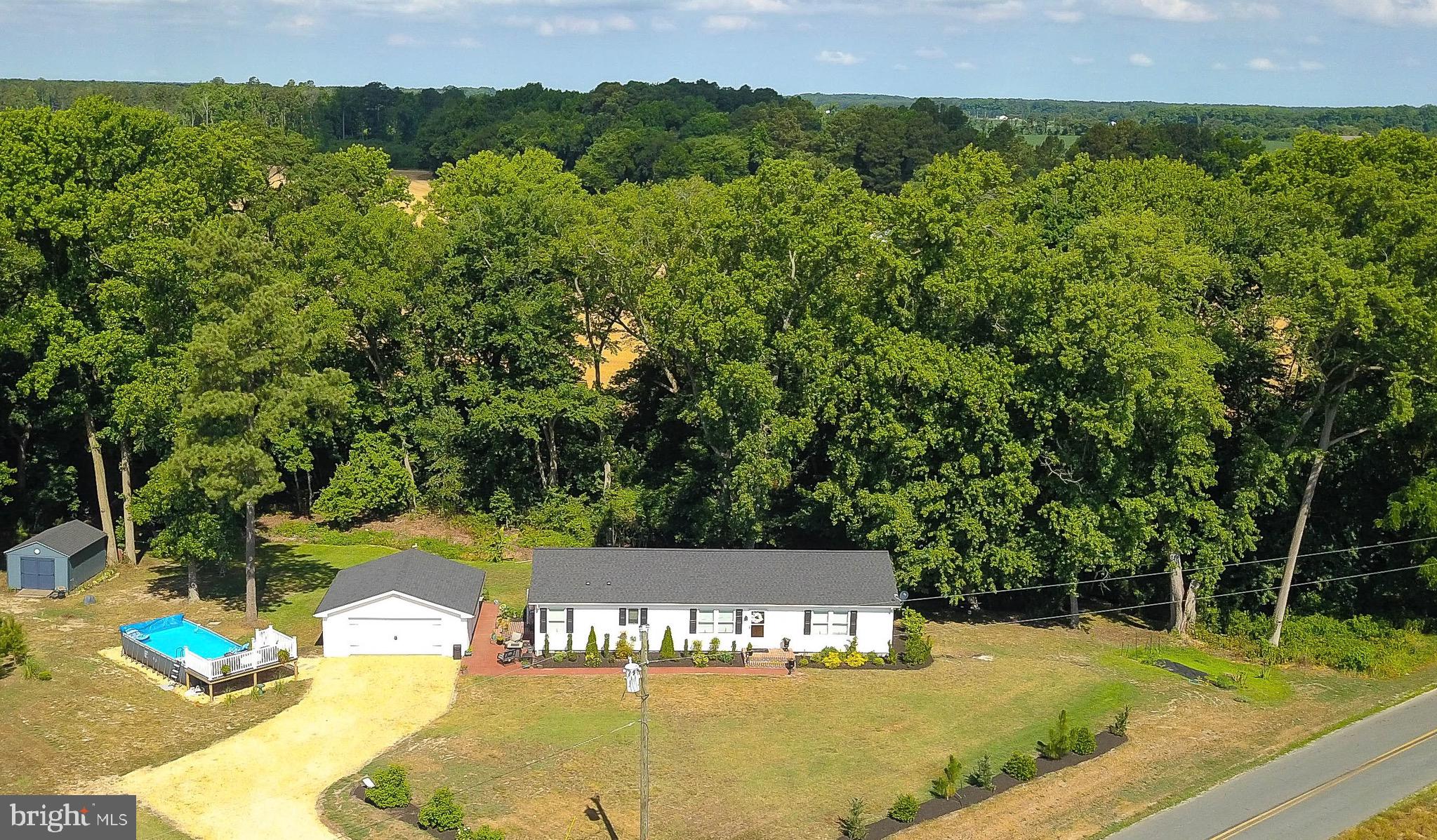 Welcome to 5520 Indiantown Road. This quality home offers so much. Nestled on a .92 ac lot bordered by Spears Creek (stream) in the rear. Offering the most amazing sunrises you can imagine. Surrounded by farmland - the views are outstanding. Completely tranquil setting. Beautifully updated interior and exterior . This home is truly like new. This home boasts an open floor plan perfect for entertaining with center island kitchen. Island has deep drawer storage. The kitchen is loaded with great features like walk in pantry with bonus double wall oven. Upgraded Bosch dishwasher, pantry cabinets with pull out shelving and plenty of storage drawers. Living area has sliders out to maintenance free deck overlooking rear yard. Enjoy a sunset from the rear deck. There is an oversized primary bedroom with ensuite bath with walk in shower, dressing area. Separate walk in closet and walk thru closet. Office was previously used as a bedroom. Bathrooms are tastefully done to add a touch of luxury to your day. Guest bath features a soaking tub and on demand hot water, hot soak guaranteed, no matter how much unwinding is needed. Laundry room with stacked Electrolux washer and dryer. Space for additional storage if needed.
Exterior features maintenance free exterior with rear deck, detached garage. Garage has cabinetry and work space. Patio area behind the garage is perfect for summer kitchen, above ground pool with deck. Backing to Spears Creek - lovely little stream makes the perfect backdrop to a summer evening on the deck or by the firepit. Gutter guards installed. Back door garden and room for larger garden.
Detached garage with work bench room for storage and vehicle.
Home has been pre inspected, septic inspected, survey completed - turnkey and truly move in ready. Seller is providing Cinch Home Warranty.
Choptank Electric now offers high speed broadband internet- Starlink is 100% at this location.
Public boat ramps in Sharptown and Vienna. Located close to Handsell for history buffs.