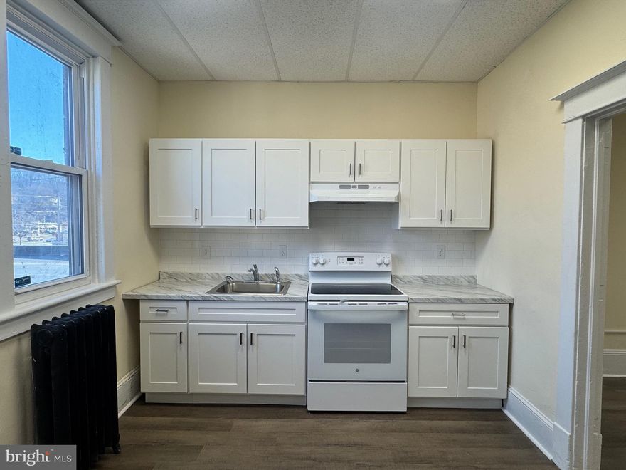 Nicely renovated 3 bedroom, 1 bath second floor apartment in the heart of Pottsville!  Located close to city amenities and local transportation systems.  Fresh paint throughout.  New bathroom.  New kitchen with fridge and stove included.  BONUS: The landlord pays for heat, water, sewer, and trash.  Tenant pays electric only, as well as parking, if needed. A parking pass can be acquired through the City of Pottsville Parking Authority by the tenant, if necessary.  The common area entrance door is always locked to keep the building secure from non-residents.  Please note there are two flights of stairs to get to this apartment.  Needed to move in: first month ($1,000), last month ($1,000), security deposit ($1,000) for a total of $3,000.