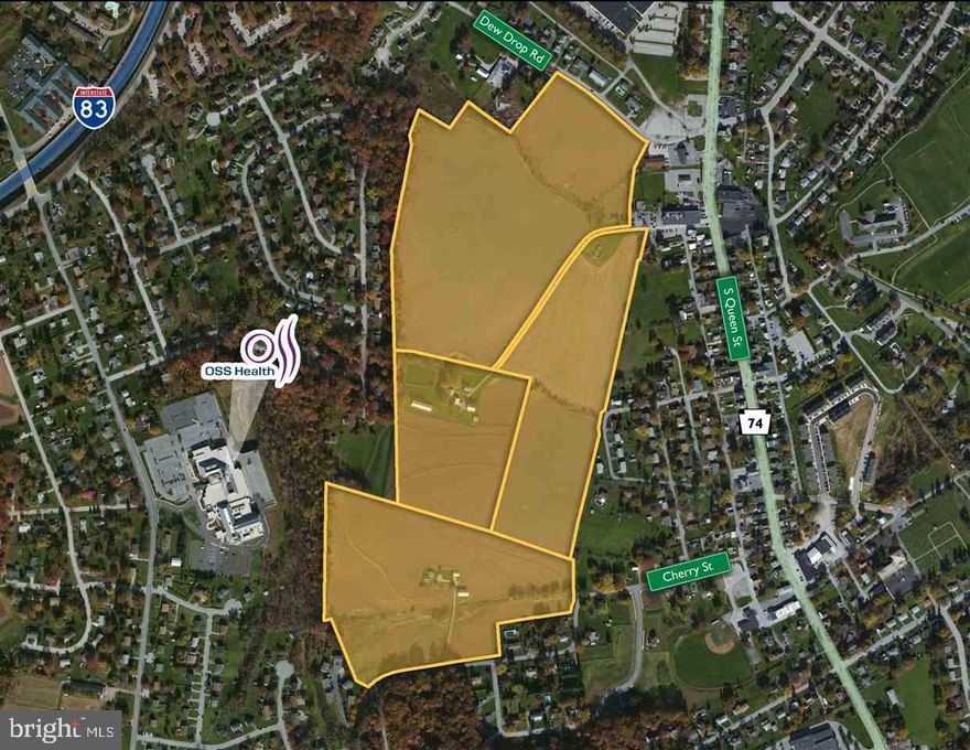 Large tract of land located just off the Queen St exit of I-83 containing 3 parcels. Parcel 0185 is zoned Commercial Shopping & is comprised of 52 +/- ac. Parcels 0186 & 0184 are zoned Commercial Office & are comprised of 35+/- ac. Permitted uses include: Banks, Personal Care Facilities, Day Care Centers, Medical Centers/Offices, Retail Stores & Restaurants.