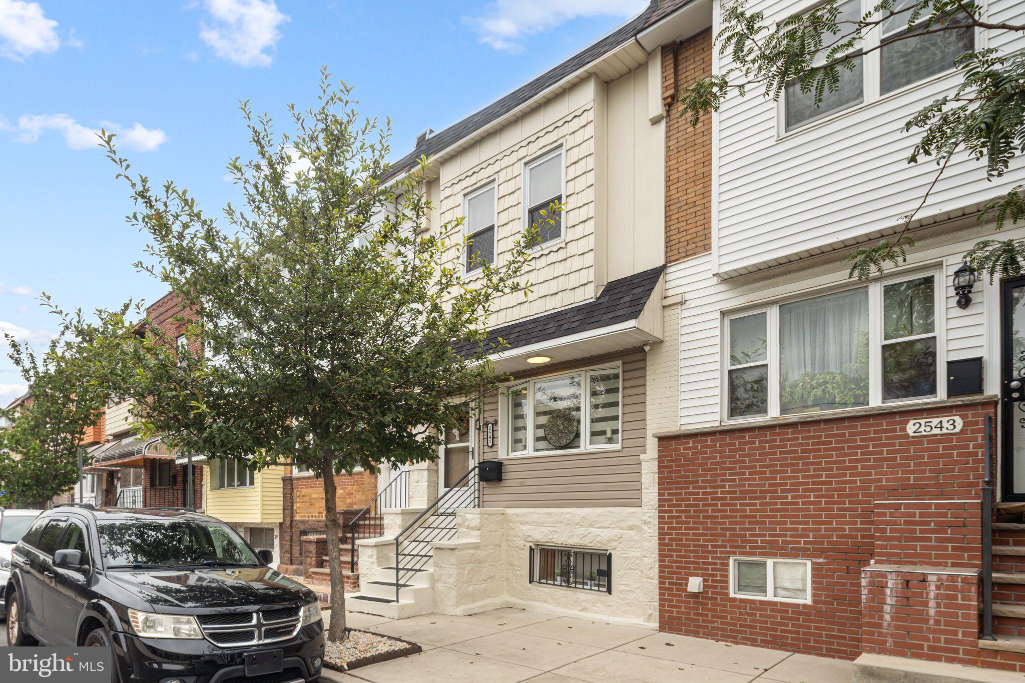 Just listed in the heart of South Philadelphia’s Whitman neighborhood, 2541 Galloway Street is a beautifully updated 3 bedroom, 1.5 bath home offering a perfect blend of modern upgrades and unique character. Renovated in 2023, this move in ready property features luxury hardwood floors, high end Samsung smart appliances, a newly renovated modern tile bathroom, central HVAC, and a brand new roof and vinyl siding on front exterior for max curb appeal. The fully finished basement adds valuable living space and includes a convenient half bathroom and a bonus room plus a hidden room concealed behind a bookshelf door, offering a one of a kind touch. Located just minutes from parks, shopping, restaurants, and I-95, this home is a rare find in one of South Philly’s most desirable neighborhoods.