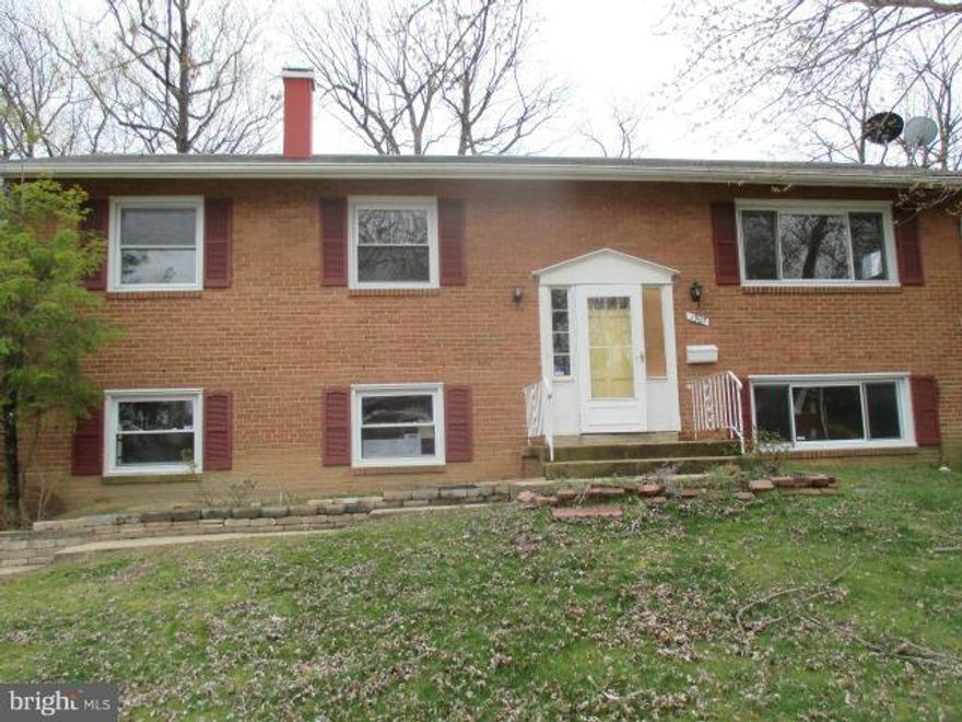 Generous size Split Foyer in District Heights offers 2 levels of living space. Main level has three bedrooms and full bath with dual vanity. Hardwood floors in living room,dining room and bedrooms. Porch of dining room with steps leading to rear yard. Lower level is finished with family room, 2 bonus rooms, full bath and storage. Walk out level on side. Close to schools & shopping .