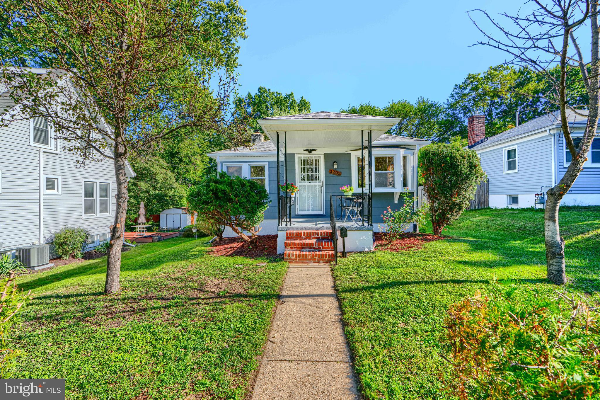 **MOVE RIGHT IN!!!** to this BEAUTIFULLY UPDATED 3 BEDROOM / 2 FULL BATH HOME w/ SUNROOM**  On the MAIN LEVEL, this home offers a cozy FRONT PORCH, a BRIGHT & SPACIOUS  LIVING ROOM/ DINING ROOM with BEAUTIFUL HARDWOOD FLOORS, BUILT-INS, RECESSED LIGHTING, and a bay window.  The GLEAMING hardwood floors continue into your 2 SPACIOUS BEDROOMS and ENCLOSED SUNROOM-perfect for an extra ENTERTAINING SPACE.   The KITCHEN features STAINLESS STEEL APPLIANCES, including a 5 burner gas stove and NEW GRANITE COUNTERTOPS w/ BREAKFAST BAR. A FULL BATH w/tub shower completes the main level.  The LOWER LEVEL has BEDROOM #3, a ROOMY FAMILY ROOM w/ faux fire place, BATHROOM #2  w/SHOWER and LAUNDRY ROOM w/ storage space.  The private rear yard is perfect for entertaining.  **RECENT UPDATES INCLUDE-New Luxury Vinyl Flooring on Lower Level 2025, Granite Counters 2025, Hardwood Floors Refinished 2025, New HVAC 2024, Water Heater 2022, New Gas Furnace w/blower 2021, NEW Roof 2020. ** This home is CONVENIENT TO SHOPPING & RESTAURANTS including all of the LOCAL Shops & Eateries, MORGAN STATE UNIVERSITY, and only a few minutes drive to LAKE MONTEBELLO w/it’s 1.5 MILE WALKING/ BIKING TRAIL and has EASY ACCESS to 695 & 95, making it a FANTASTIC OPPORTUNITY!! ***DON'T MISS THIS!!!***
