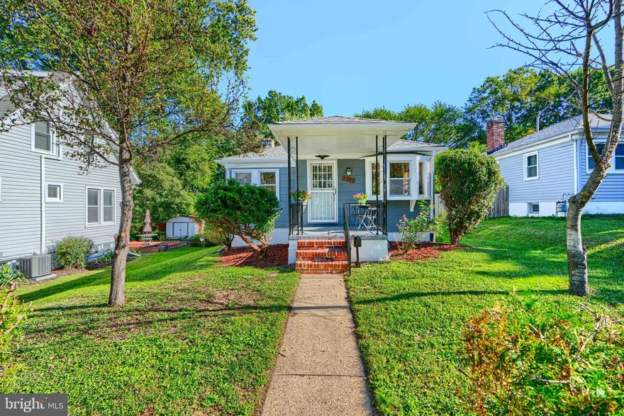 **MOVE RIGHT IN!!!** to this BEAUTIFULLY UPDATED 3 BEDROOM / 2 FULL BATH HOME w/ SUNROOM**  On the MAIN LEVEL, this home offers a cozy FRONT PORCH, a BRIGHT & SPACIOUS  LIVING ROOM/ DINING ROOM with BEAUTIFUL HARDWOOD FLOORS, BUILT-INS, RECESSED LIGHTING, and a bay window.  The GLEAMING hardwood floors continue into your 2 SPACIOUS BEDROOMS and ENCLOSED SUNROOM-perfect for an extra ENTERTAINING SPACE.   The KITCHEN features STAINLESS STEEL APPLIANCES, including a 5 burner gas stove and NEW GRANITE COUNTERTOPS w/ BREAKFAST BAR. A FULL BATH w/tub shower completes the main level.  The LOWER LEVEL has BEDROOM #3, a ROOMY FAMILY ROOM w/ faux fire place, BATHROOM #2  w/SHOWER and LAUNDRY ROOM w/ storage space.  The private rear yard is perfect for entertaining.  **RECENT UPDATES INCLUDE-New Luxury Vinyl Flooring on Lower Level 2025, Granite Counters 2025, Hardwood Floors Refinished 2025, New HVAC 2024, Water Heater 2022, New Gas Furnace w/blower 2021, NEW Roof 2020. ** This home is CONVENIENT TO SHOPPING & RESTAURANTS including all of the LOCAL Shops & Eateries, MORGAN STATE UNIVERSITY, and only a few minutes drive to LAKE MONTEBELLO w/it’s 1.5 MILE WALKING/ BIKING TRAIL and has EASY ACCESS to 695 & 95, making it a FANTASTIC OPPORTUNITY!! ***DON'T MISS THIS!!!***