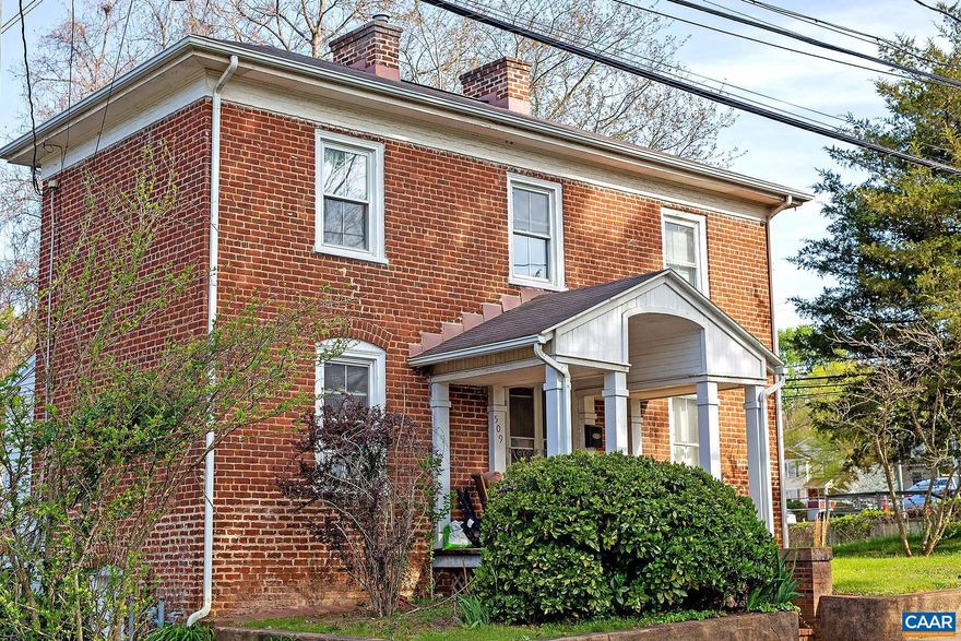 Move-in Ready! This 3 bedroom, 2 bath Fifeville home is located off of Cherry Ave and provides close proximity to UVA Medical Center and downtown. Enjoy the convenience of living near shopping, dining, and entertainment! The Dairy Market, IX Park, 5th St Station, and I-64 access are all within a 1-2 mile radius. Ideal property for UVA graduate students, and medical residents!  Built in 1920, this two-story brick home offers 1,430 sqft of living space, a mix of hardwood, vinyl, and carpeted floors, and charming decorative accents throughout. The main level consists of a living room, an eat-in kitchen with a refrigerator and gas oven, and a primary bedroom with an attached full bath. Upstairs you will find two additional bedrooms, a full hall bath, and a laundry nook (washer/dryer included). Tandem off-street parking is available.  Residents are responsible for lawn care, front landscaping, and all utilities. Please note that there is no central ac in the home. One window ac unit provided by owner. Occupancy is limited to no more than 3 unrelated individuals. No undergrads or pets are allowed.