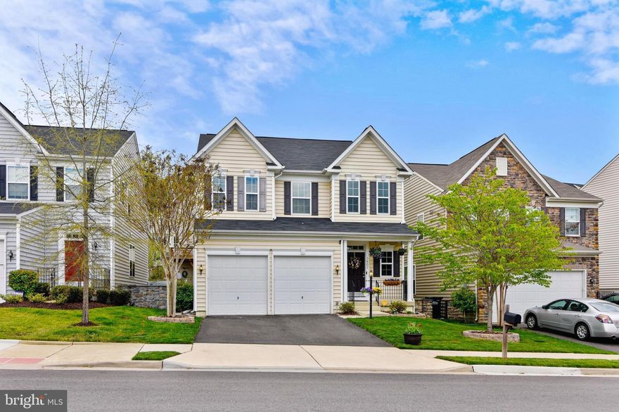 Gracious well maintained 4BR, 3.5BA colonial in Eagles Pointe. This K. Hovnanian York model has an open concept main floor plan and a 2-story foyer. It boasts an upgraded kitchen with stainless steel appliances featuring double ovens, cooktop, lots of granite countertop space, and a walk-in pantry. The formal dining room opens to a large family room with a gas fireplace. The 2nd level features a spacious master suite with two walk-in closets and luxury bath, which includes a double vanity, soaking tub, and stand up shower. Just down the hall are three bedrooms, a laundry room, and full bath.The lower level features a finished recreation room, 3rd full bath, storage closet with built-in shelves, large unfinished space with a lot of potential, and walk out steps to a well maintained yard with a deck for outdoor entertaining.The Eagles Pointe HOA has many amenities, including a pool, tot lots, picnic areas, gym, and indoor/outdoor banquet space with full kitchen. This home is in a prime location close to Marine Corps Base Quantico and Fort Belvoir, great schools, Stonebridge Potomac Town Center, Wegmans, and Potomac Mills mall, as well as parks such as Leesylvania State Park and Prince William County Forest. For those who commute there are many options, such as the VRE, Express bus/van, and commuter lots. A great place to call home!--