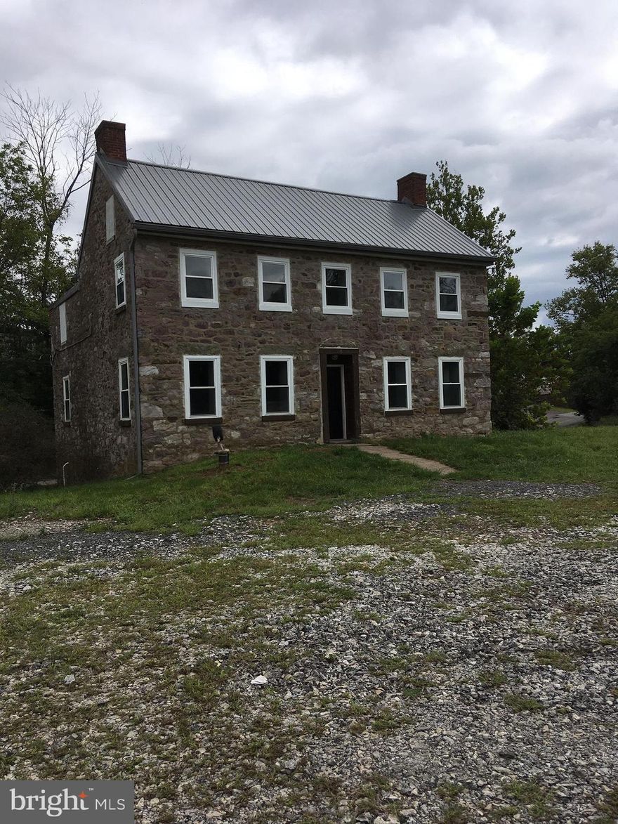 This is not a pet friendly property.  This old home comes with some history.  Back in the day, the canals of Phoenixville came down this far and this was the lock house for the canal and the canal masters home.  This stone home has veen updated but there is still the old quality here like the deep window sills and the stone for the fireplace.  Fireplace is non working now, but it is still beautiful.  This home sits in an industrial park and is the only house down this far.  It is near the walking trail that takes you all along the river.  If you like a large parking area and no neighbors, this is the house for you.  You enter this home into the Living Room which is an open concept with the Dining Room.  It has a renovated kitchen.  Upstairs you will find the bedrooms and full bath.  Look out the window, you can see the walking trail and the river.   It has newer carpeting and paint throughout the home.  This house did flood during Hurricane Ida.   Landlord is looking for applicants to have a credit score of 600 or more, have no criminal background and this is a month to month lease.  This home is located in Oaks but has a Phoenixville mailing address.  Spring- Ford Area School district. NO PETS!
