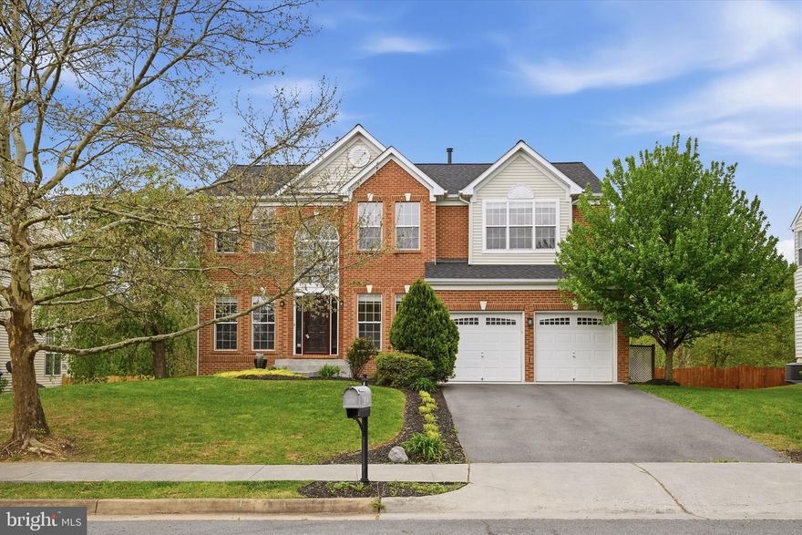 Spacious and beautifully maintained 6-bedroom, 4-bath brick-front Colonial situated on a picturesque lot. Quality craftsmanship is evident from the moment you enter the impressive two-story foyer, flanked by formal living and dining rooms. The main level also features a generously sized home office—perfect for remote work—and an inviting family room with a stunning stone fireplace.

The gourmet kitchen is designed for both everyday living and entertaining, offering a large center island, table space, stainless steel appliances, pantry, and abundant cabinet and counter space. The breakfast area opens to a rear deck, ideal for grilling and hosting gatherings.

Upstairs, the open two-story overlook leads to a luxurious primary suite featuring a vaulted ceiling, a spacious sitting area, and an impressive custom walk-in closet designed for both style and function. Thoughtfully outfitted with built-in shelving and multiple hanging areas, the closet offers exceptional organization, while a cedar-accented wall adds a touch of warmth and natural elegance—ideal for preserving garments and adding rich character to the space. The spa-like ensuite bath offers a jetted tub, separate shower, and dual vanities.

Bedrooms two, three, and four are all generously sized and thoughtfully designed, each featuring large closets and abundant natural light. These versatile rooms offer plenty of space for family, guests, or a home office, with comfortable layouts that easily accommodate a variety of furniture arrangements. They share a well-appointed full hall bath, providing both convenience and functionality for everyday living.

The finished lower level is filled with natural light and offers a sixth bedroom, full bath, and a large recreation room complete with a custom wet bar. Walk out to the stamped concrete patio and enjoy the expansive, private backyard with raised garden beds, mature landscaping, beautiful perennials, and fruit trees—perfect for relaxing or entertaining outdoors.

Major updates include a brand-new roof and HVAC systems that are approximately 2 years old, offering peace of mind for years to come.