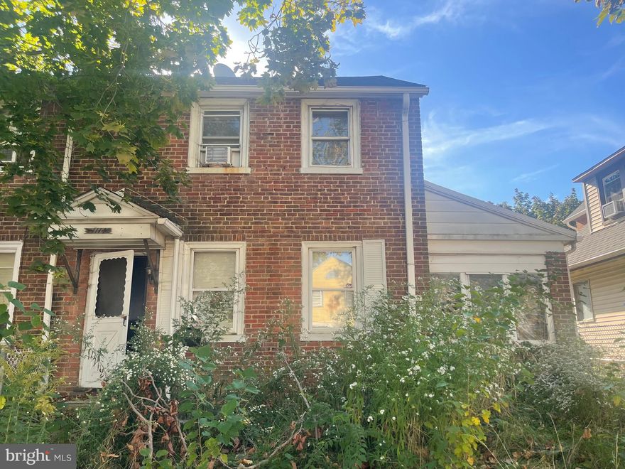 Investor Alert! Great brick end row with  rear off street parking spot, front yard, hardwood tile and carpet throughout,  newer hvac and hot water heater.  Being sold in as-is condition.