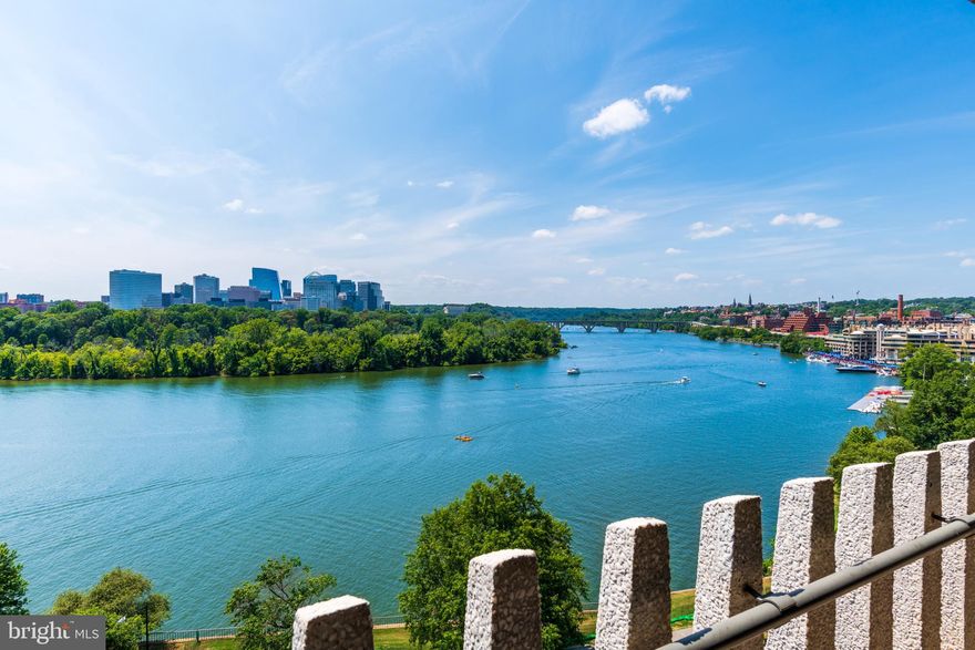 Best river view in the Washington DC area! Rare "On-the-Point" floor plan with spectacular river view.  Over 3000 sq. ft. interior. Over 120 ft. long wrap around balcony, fantastic for entertaining.  Live on top of the river with a view that spans 3 bridges,  The  Kennedy Center, Lincoln Memorial, Roosevelt Island and the Georgetown  waterfront. Watch crew boats along the river at dawn and spectacular skies at  sunset.  A moving masterpiece! 2 bedroom and den, 2 .5 baths. Floor to ceiling windows surround the bright and  dramatic interior with balcony access from every room.  Extra large primary bedroom and spa bath with the best view in town! Library/home office has handsome built- ins and serving  bar. Second bedroom in opposite wing from primary bedroom offers privacy. Kitchen with access to balcony. Beautiful spacious separate dining room.  Generous walk in closet in primary bedroom plus ample closet space and additional storage room. Three underground garage spaces included! Washer/dryer hook up. Fee includes property taxes, utilities, maintenance of HVAC, basic cable, internet, and parking.   Watergate amenities include exercise room, salt water pool, on-site shopping, 24 hour desk, roof deck. Walk to Foggy Bottom Metro, Kennedy Center, Whole Foods, and Georgetown Waterfront. Enjoy on-site shopping, restaurants, Watergate Hotel, and many more conveniences.