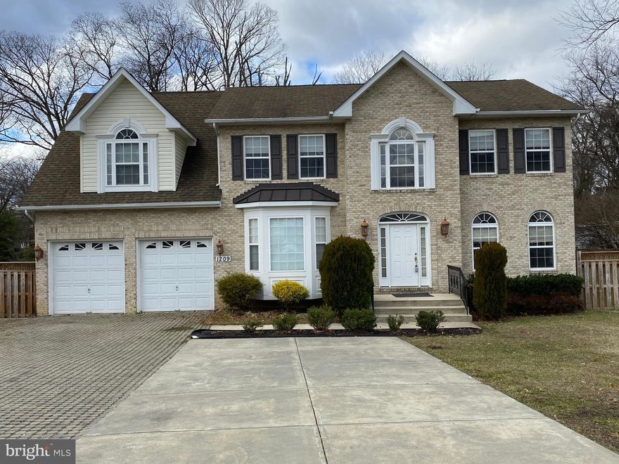 PRICE REDUCED for a quick sale! Motivated seller. House is vacant. Please show anytime! Over 4,000 finished sq ft home PLUS over 1900 sq ft unfinished basement! 4 bedrooms, and 3.5 bath. Main level porcelain floors, and arched doorways. Features gourmet eat-in-kitchen with granite counter tops. Stainless appliances, center island, 42" cabinets. Huge morning room next to the kitchen. Family room with tray ceilings, gas fire place, dual zoned AC and heat. Study room with bay windows and built-ins. 2 story foyer w/Palladian windows. Owner suite with two walk in closets and full bath.