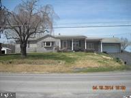 3BR ranch. Large bedroom cedar closets. Hardwood floors. 2 car attached gar w/breezeway & 1 car detached gar. Also a 36x40 pole garage which can be used for private business or horses. With a few upgrades & TLC this property has great potential. Located in a rural farming area only minutes from Selinsgrove & Hbg. (Property being sold ''as is'')