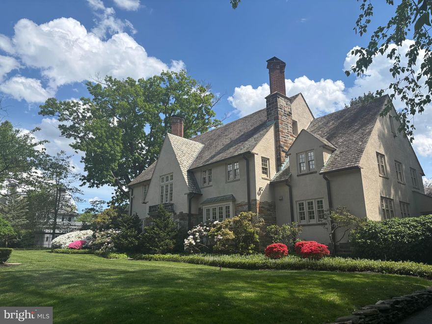 Welcome to 3 Whitfield - a timeless stone and stucco beauty, impeccably maintained, tastefully updated, located on highly desirable Whitfield Road.  This gem offers classic proportions, high ceilings, french doors, mouldings, hardwood floors and all the trappings of sound quality construction you would expect from this 1925 Tudor. The stunning,  renovated gourmet kitchen  features a bright, chic vibe with its white marble countertops and all the amenities a serious cook appreciates, from the motion activated faucets and base cabinet lighting to the luxury appliances.  Double islands provide space for entertaining and creating masterpiece meals, at once. Cooking options extend to the back garden, where the owners installed a hardwired gas grill with built in counter surround.  Architectural details and highest quality craftsmanship are notable throughout this sophisticated home - both elegant and livable. Five bedrooms and 5 full baths afford space for you and your friends and family.  First floor study and year round sunroom are in addition to traditional  living and dining rooms.  An expansive recreation room on the third floor has vaulted ceilings and is built for all levels of enjoyment!   Private, fenced back garden with generous flagstone patios connect seamlessly with the dining room and kitchen for approachable, relaxed outdoor living.   A well maintained irrigation system keeps the grounds lush.  Automatic gate provides access to attached garage.  Superb location on Roland Park side of Guilford.