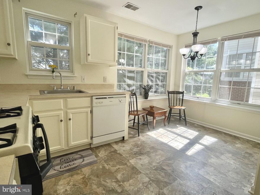 SELLER IS MOTIVATED! Location, Location!!  Opportunity is waiting for you to own this spacious and well maintained 3 Bedroom / 2 Full Bath Condo  situated comfortably in the sought-after Taylor Ridge Community. As you enter the spacious unit you'll be greeted with a freshly painted Neutral shade of Gray on the walls and the woodwork and moulding surround is  precisely painted white which accents the total workmanship.  The  Living room and Dining Room  make up an amazing shared area of 21.5 ft X 19 ft.  creating a pleasing amount of Living Space. Slider doors open from the Living room  onto the covered porch which offers  42 sq.ft. of relaxing-space, an ample sized storage closet, plus trees to add partial shade so you'll be able to sit back  and enjoy a country feel & seeing Deer visiting the complex regularly. The Primary Bedroom boasts a spacious walk-in closet, ceiling fan and plenty of wall space for the larger pieces of furniture and your wall decor. Measuring 13X12 this room  creates a comfort zone for anyone.. Both the Primary bath and Main bath are roomy with tiled floors, a Shower/ Tub combination and well-lit vanity lighting shining above making  mirrors use pleasant. The 2 additional bedrooms are designed with plenty of wall space,  bi-fold door closets & leaving  room to roam. The Primary bedroom  is located separately from the additional other 2-bedrooms. Excluding the bathrooms, kitchen &  the utility room, neutral Luxury wide plank vinyl flooring  will be immediately noted and it blends beautifully throughout .Natural light adds a cheery brightness to the home which is due to the placement of the windows especially n the Kitchen. In the Kitchen an appealing area for your table space and chairs can be situated with  a pleasant view to enjoy  the change in seasons. The size of the kitchen shall please  with it's white cabinetry, sufficient counter space and an  added work area /nook that will certainly be handy for many uses.  The ( Washer & Dryer ) is enclosed with Louvered double doors that are set at the side entrance to the kitchen which provides for convenient access. The utility room sets alone to the side of the hallway  which houses the High Energy-Efficiency Aqua Therm Heating System with Gas Water Heater & the Outside Compressor which   are all under 2 Years Old! And there is more. The Condo offers ..YOU HAVE TO TAKE THE TIME TO VISiT THE CLUBHOUSE  and see the extra  BENEFITS YOU"RE BEING OFFERED,  The Location of 1301 Unit is Directly across from  the  Community Center/Club House.  The Building is secured with Key Entry & You will have access to the Fitness/Workout Center Room  (+Shower & restroom availability), a large Meeting Room, An Amazing Party Entertaining Room which is tastefully Decorated. plus a  fabulous kitchen to make it all happen right here, Taylor Ridge has a Grand Summertime Fun Swimming Pool along with Tennis Courts. Plenty of well Maintained Sidewalks all-about the grounds for walking . It's a Pet-Friendly community. Convenient location to Grocery Stores, Restaurants, Pharmacies , Clothes shopping & Schools and interstate access. Less than a 20 minute drive to  Aberdeen Proving Ground .  Handicap Parking spaces are available with plenty of unassigned parking.  The Condo Offers Coded Security Entry. This is a Must see Condo.