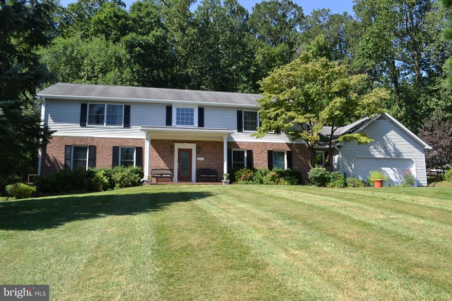 ENJOY THE PRIVACY THIS CUSTOM BUILT COLONIAL FEATURES W/4,600SQFT +/- OF FIN LIVING SPACE, 2 SPACIOUS MST BDRMS EACH W/PRIVATE FULL BATH-IDEAL FOR HANDICAP OR IN-LAW; OVER $285K IN CUSTOM REN. HAS CREATED A LOVELY OPEN KIT & FAM RM, FULL SEASON SUNRM, 2-ST FOYER, SEP D/R, 1ST FL OFFICE, LAUNDRY, ANDERSEN REPL WINDOWS THRUOUT, 2 ZONE HEATING/AIR, FIN L/L,STORAGE GALORE & MORE. BETTER HURRY !!!