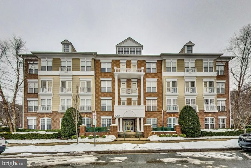 Beautiful two bedroom, two bathroom unit located in a secured, elevator building in King Farm. This unit features a light filled living room with lots of windows,  separate dining area, a gourmet kitchen with corian countertops, stainless steel appliances and a built in wine rack and spacious breakfast area.  Primary bedroom with ensuite bath features a double vanity, jacuzzi and a spacious walk-in closet with drawers and adjustable shelving.  Full hall bath leads to large second bedroom. Washer and Dryer located in unit. Great location - Just 1 block away from Shady Grove Metro Station! Free Shuttle Bus to Metro included.  Just a short walk to shopping and restaurants. Rent includes two assigned parking spaces.