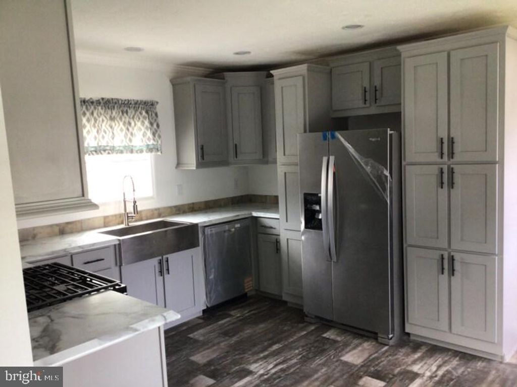 Photo of 7008 Huber Drive, MORRISVILLE, PA 19067 (MLS # PABU2108104)