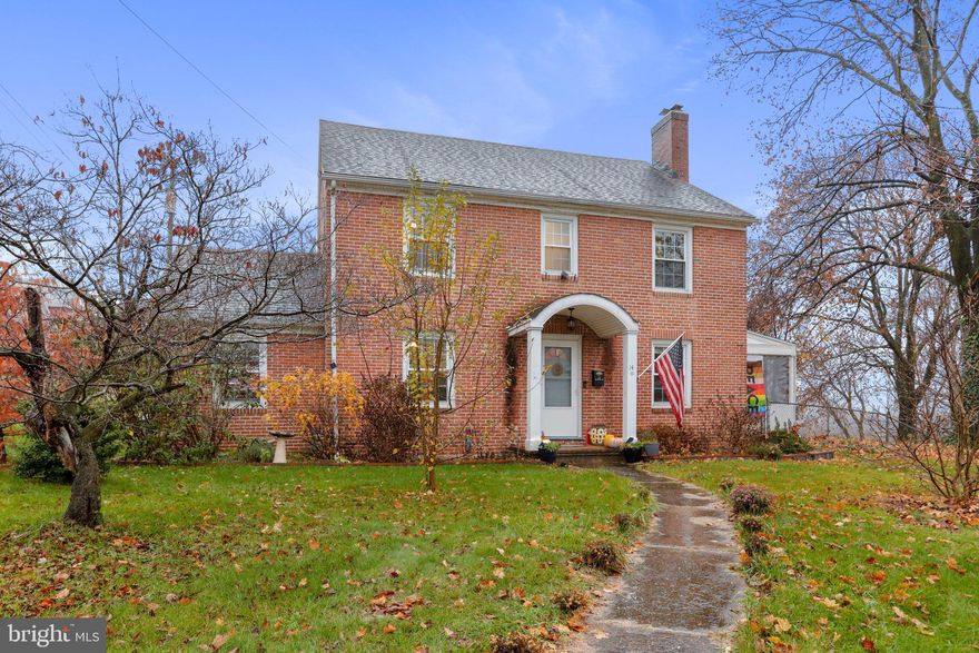 Nestled atop a hill in Hancock, MD, this splendid 2-story brick colonial home offers a picturesque vista overlooking Main St. and the mesmerizing expanse of the C&O Canal. With 4 bedrooms and 1.5 bathrooms, this abode has been thoughtfully updated, showcasing a blend of modern convenience and classic charm.

Step inside to discover the allure of new hardwood flooring that graces most of the home, leading you through the inviting spaces. The main floor welcomes you with a spacious living room, ideal for relaxation and entertainment, seamlessly connected to a dining area bathed in natural light. A bonus room and an office offer versatility, catering to various lifestyle needs.

The heart of this home lies within its remodeled kitchen, a testament to both functionality and elegance. Featuring contemporary amenities and stylish finishes, it beckons culinary adventures and cherished gatherings.

Descend to the full basement, a haven for storage or a personalized retreat. Beyond, a generous rear lawn invites outdoor leisure and activities, complemented by a paved driveway providing convenient off-street parking.

This property champions environmental mindfulness, boasting solar panels on the rear roof that significantly reduce energy costs, making a positive impact on both the planet and your utility bills.

Here, modern comfort meets timeless allure, offering a haven that balances convenience, efficiency, and the idyllic charm of Hancock living. Welcome home to this captivating colonial gem.