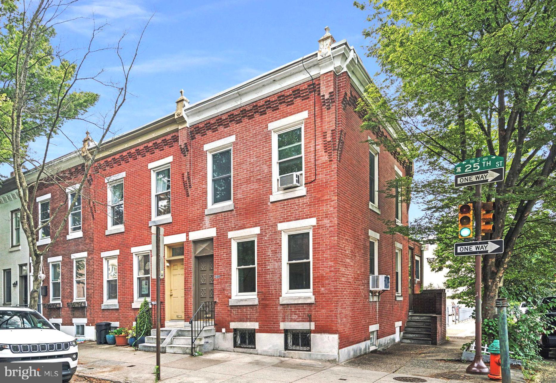 Sunny, corner, brick 2 bedroom, 1 bathroom home on a tree-lined Fitler Square block. Steps from idyllic Fitler Square, Schuylkill Banks Boardwalk, and Schuylkill River Park with its playgrounds, dog park, courts and community gardens. Sunlight streams in through large windows on three sides of the home with a side door adding to the airy feel of this lovely space. Past the entry vestibule with original glass door, enjoy the gracious living room with light pouring in over the original inlaid floors. The spacious dining room offers room for a library or office nook in addition to a large dining area. Continue to the charming kitchen with a large window and side door to let in a breath of fresh air under a shade tree. Up the straight stairs are two bedrooms, each with windows on two sides - the primary with a beautiful original built-in armoire - and a bathroom with walk-in shower. The spacious, clean lower level houses the washer and dryer. Located across from the Philadelphia School and within the Blue Ribbon award winning Greenfield School catchment, this home is convenient to HUP, CHOP, UPenn, Drexel, 30th Street Station and all highways. Easily walkable to Rittenhouse Square, the museums, and some of the best restaurants, shopping and recreation in the city. Endless possibilities as your new home, investment property or renovation.