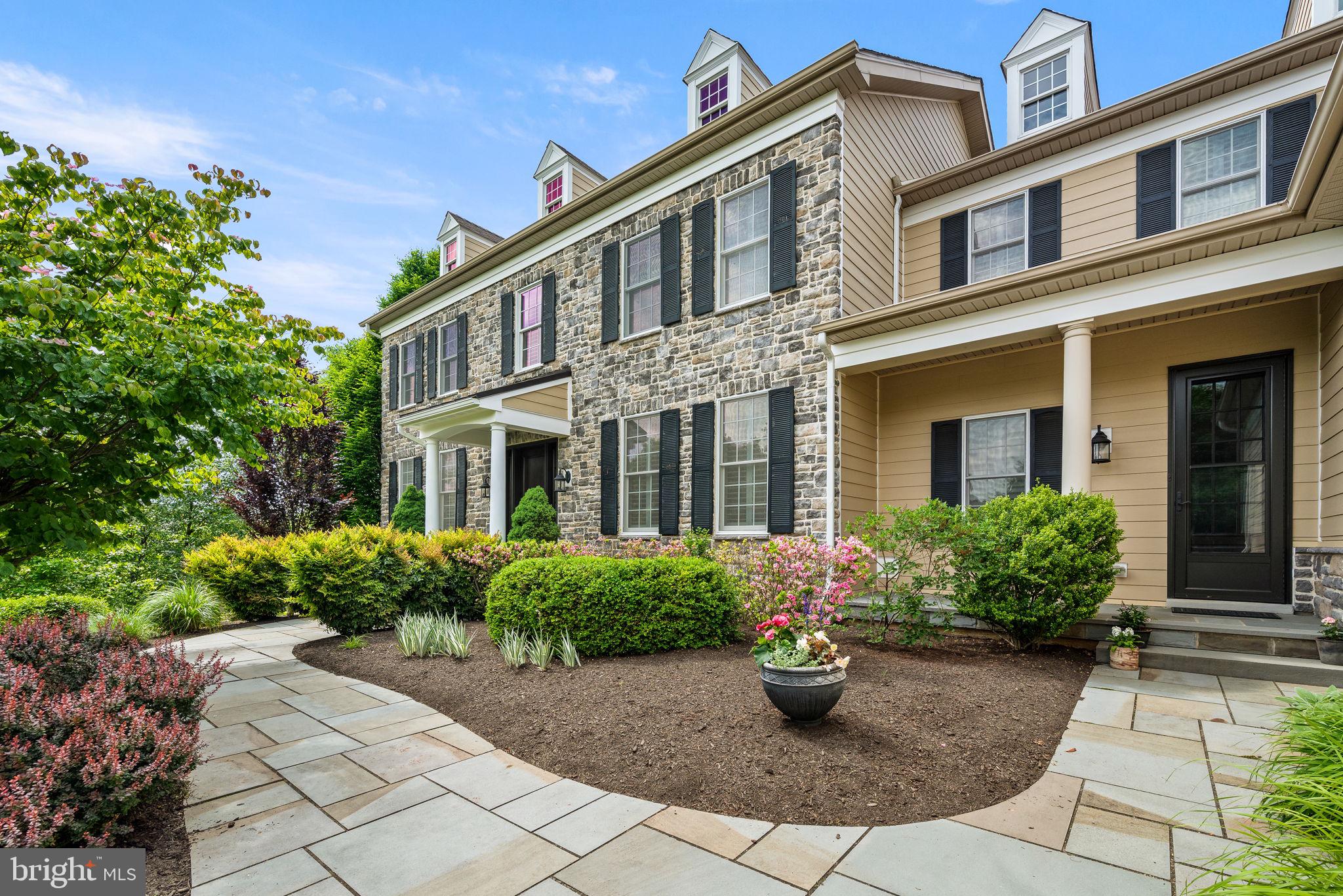 This stunning property offers a perfect blend of elegance, comfort, & tranquility. The 5 bedroom, 5.5 bath is Nestled in the Estates at Chadds Ford community. From the moment you approach this grand colonial, the attention to detail is evident. The extensive stone façade is complimented by the fiber cement siding. As you approach the home on the custom slate bluestone walkway, you may enter via the formal main entry or the ancillary entry serving the mudroom. As you step inside the main entry, you'll be captivated by the tall ceilings and notice the abundance of beautiful hardwood floors, custom molding, and plantation shutters that extend throughout the entire house. The dramatic foyer greets you with an impressive curved oak staircase with painted risers, metal balusters and handsome wainscotting. To your left is a study with a stunning custom built in bookcase. To your right is a spacious dining room and adjoining butlers pantry providing convenient access to all of your entertaining needs! Straight ahead is the expansive sunken family room with a captivating stone fireplace equipped with a highly efficient wood stove insert. Adjacent to the family room is the fully renovated gourmet kitchen and adjacent sitting area complete with ample semi-custom Omega cabinetry, quartz countertop, oversized Shaws farmhouse sink, Wolf and Subzero appliances, and Cove dishwasher. The large nine foot island includes a second sink, a Sub Zero wine & beverage refrigerator and Wolf drawer microwave. This kitchen and seating area is a perfect place to unleash your culinary skills while entertaining your guests lounging in the adjacent seating area. The kitchen also provides access to the 3 car garage, rear staircase, and custom laundry with custom cabinetry, large stainless sink and granite counter tops. Ascend the rear staircase to the 2nd floor which offers access to 4 bedrooms, each with its own on-suite bath & ample closet space with custom, built-in organizers. The main bedroom complete with vaulted ceiling, adjacent large sitting and tv area, and ample walk-in closet space. The walk-out basement impresses as additional entertaining with stone surround gas fireplace, theater room, bar area with undercounter beverage refrigerator and keg refrigerator and including a full guest bedroom with bathroom and large walk in shower, fitness room and ample storage and built in bookcases throughout. Walk out of the basement to a spacious, private and shaded bluestone patio with large custom fireplace. The rear deck & patio have wonderful views of the lush fully fenced level back yard perfect for all of your entertaining needs. Conveniently located, this home offers easy access to a variety of amenities. You will be just moments away from shopping centers, dining options, recreational parks, & renowned schools. Don't miss the chance to make this exquisite dream house your home. Set your appointment today!