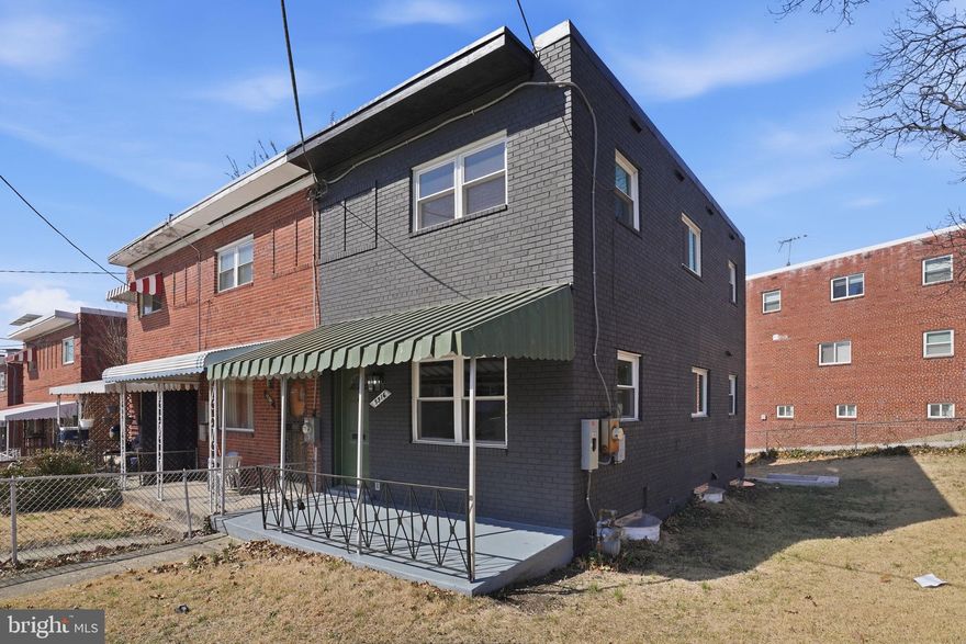 Welcome to 5916 8th Street NE, a beautifully refreshed  home nestled in the heart of sought-after Riggs Park! This spacious 3-bedroom, 2.5-bath residence blends classic charm with modern updates throughout. Step into a bright, open living and dining space enhanced with refinished hardwood floors, fresh paint, and stylish finishes. The updated kitchen features ample cabinetry and direct access to the backyard—perfect for outdoor dining or gardening. Upstairs, you’ll find three generously sized bedrooms and a full bath, while the  lower level offers flexible space for a family room, home office, gym, or future guest suite. Recent improvements include updated flooring, fixtures, and enhanced lighting. Enjoy the private, fenced backyard with a covered porch, ideal for entertaining or relaxing in your own urban retreat. This home offers easy access to Fort Totten Metro, shopping, parks, and the new development at Art Place. With central A/C, natural gas heat, and a fantastic location near schools and public transit, this move-in ready home is a rare find in NE DC. Don’t miss your chance to own a solid brick home in a growing neighborhood!