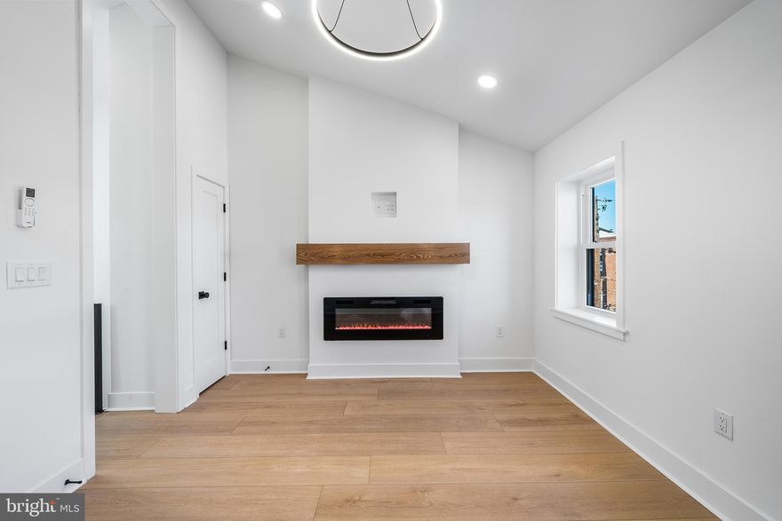 Now offered at $564,000.

Welcome to 714 Earp St, a fully renovated, professionally permitted residence rebuilt in 2026, offering 4 bedrooms and 3.5 bathrooms with an APPROVED 10-YEAR TAX ABATEMENT, located in the heart of Passyunk Square, just blocks from East Passyunk Avenue, one of Philadelphia’s most vibrant dining and shopping corridors.

Thoughtfully redesigned with premium finishes throughout, the home’s centerpiece is a true primary suite occupying the entire third level—delivering a private top-floor retreat rarely found within comparable South Philadelphia homes. This level features a striking vaulted ceiling approaching 12 feet in height, an elegant electric fireplace with custom mantle, a spa-inspired primary bathroom with a luxury walk-in shower and 60-inch double-sink vanity, expansive custom closets, and a dedicated mini-split system providing independent heating and cooling for the entire floor.

This residence was taken down to the studs and comprehensively rebuilt, featuring a brand-new roof and all-new plumbing, electrical, and HVAC systems — all completed under permit to provide lasting quality and peace of mind.

The main level emphasizes both function and flexibility, blending open living space with a rare first-floor bedroom and full bath — ideal for guests, a private office, or adaptable dining and everyday living.

The second floor offers two generously sized bedrooms with wide closets, a beautifully finished full bathroom with tub, and a dedicated laundry room with utility sink. The finished basement—modest in size yet highly functional—provides excellent storage and a convenient half bath.

The kitchen is outfitted with shaker-style cabinetry, quartz countertops, a custom vent hood, LG appliances, a pot filler, garbage disposal, and a workstation sink — seamlessly blending elevated design with everyday functionality.

Additional features include wide-plank luxury vinyl flooring throughout, Nest smart thermostats, 200-amp electrical service, multiple HVAC zones, a high-efficiency A. O. Smith Signature 300 smart electric water heater with leak detection, a Ring camera system, and all appliances included for turnkey living.

Enjoy exceptional walkability to award-winning restaurants, cafés, boutique shops, the Italian Market, and East Passyunk Avenue—making this home the ideal blend of refined living and premier urban convenience.

Seller is a licensed real estate agent in the Commonwealth of Pennsylvania.