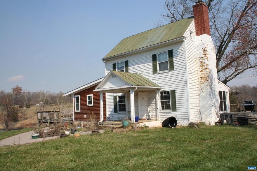 This extraordinary 156+/-acre estate presents a unique opportunity to own a piece of Virginia's countryside paradise. Encompassing two separate parcels, the property boasts many uses. A captivating stream winds its way through both parcels, adding to the tranquility and natural beauty of the land. This stream is more than abundant for livestock. The 1848 farmhouse itself embodies a practical and unpretentious spirit. Featuring 2 bedrooms and 1 � bathrooms, it offers a comfortable and functional living space. There is an updated bathroom with radiant heat flooring. Hardwood floors adorn most of the living space. The renovated sun porch with ceramic tile provides a spot to relax and savor the views. The expansive wrap-around deck invites you to enjoy the peacefulness of the countryside, perfect for entertaining or simply soaking in the fresh air. The 101+/- acres offers a functional 5-bay garage providing ample storage for equipment, vehicles, or hobbies, while the unfinished living space above the garage holds incredible potential for expansion. A solar self sustaining g