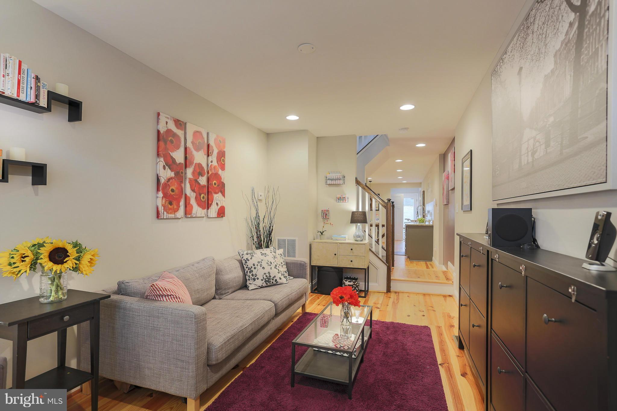 NEW PRICE Canton Row Home on Quiet Street with upgrades & 10 YR CHAP TAX CREDIT until 2023. First floor features wide plank wood floors,gourmet kitchen w/inviting space for entertaining. Finished lower level with full bath. Modern bath with sky lights...two bedrooms on upper level. Patio, ADT Alarm, Samsung front loading washer (2014), new sump pump (2015). See it today!