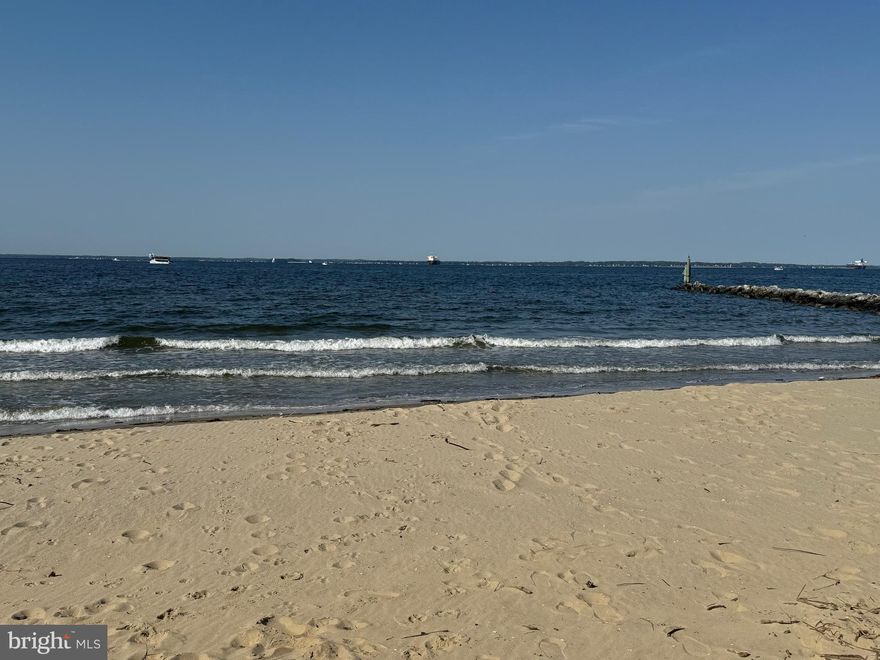 Sit on the dock of the bay, and watch the clouds roll away! Amazing location with easy access to a private community beach and pier steps from your front door. Relax on your upper balcony off of the primary bedroom and watch the ships go by up and down the Chesapeake Bay. Next to Kentmorr Marina featuring an amazing restaurant and local hang-out, this home gives you the opportunity to enjoy any type of vibe you may want.  Upgrades include a New American Standard High-Efficiency Heat Pump/AC and backup propane furnace installed in 2022. Crawl space encapsulated and dehumidifier installed. New Blown-In Attic Insulation R49 installed by Total Home Performance. Home Energy Audit completed by Delmarva Power and considered to be an energy-efficient home. French Drains from the downspouts. New exterior LED lighting on self-timers. Freshly painted, removed all carpet, and installed New LVP flooring