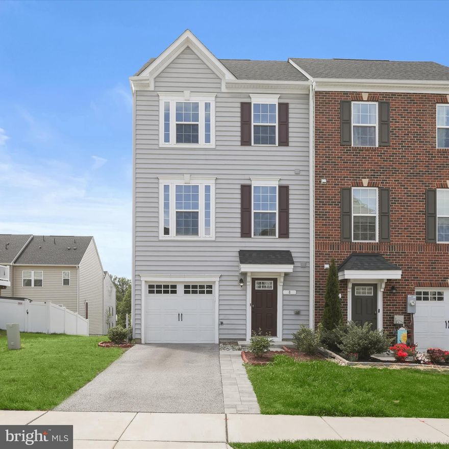 Step into the welcoming lower-level foyer featuring LVP flooring and a convenient powder room. Just beyond, a spacious family room awaits, offering plush carpeting, recessed lighting, and sliding glass doors that open to a private patio - perfect for relaxing or entertaining. Upstairs, you’ll find a bright and inviting living room with plush carpeting, a soft neutral color palette, recessed lighting, and large windows. The open-concept kitchen impresses with an oversized island breakfast bar topped with granite, double sinks, stainless steel appliances, gas cooking, a pantry, and ample solid wood cabinetry. The adjoining dining area features recessed lighting and sliders that lead out to a spacious deck for seamless indoor-outdoor living. This level also includes a second powder room for added convenience. On the upper level, the expansive primary suite showcases tray ceilings, bright windows, a walk-in closet, and a luxurious en suite bath with double vanities and a modern walk-in shower. Two additional bedrooms - each with ceiling fans and plush carpeting - are also on this level, along with a conveniently located laundry area. Additional highlights include a one-car garage, a private driveway, and ample overflow parking for guests. The home is conveniently located near I-95, I-195, BWI Airport and the MARC train station in Halethorpe.