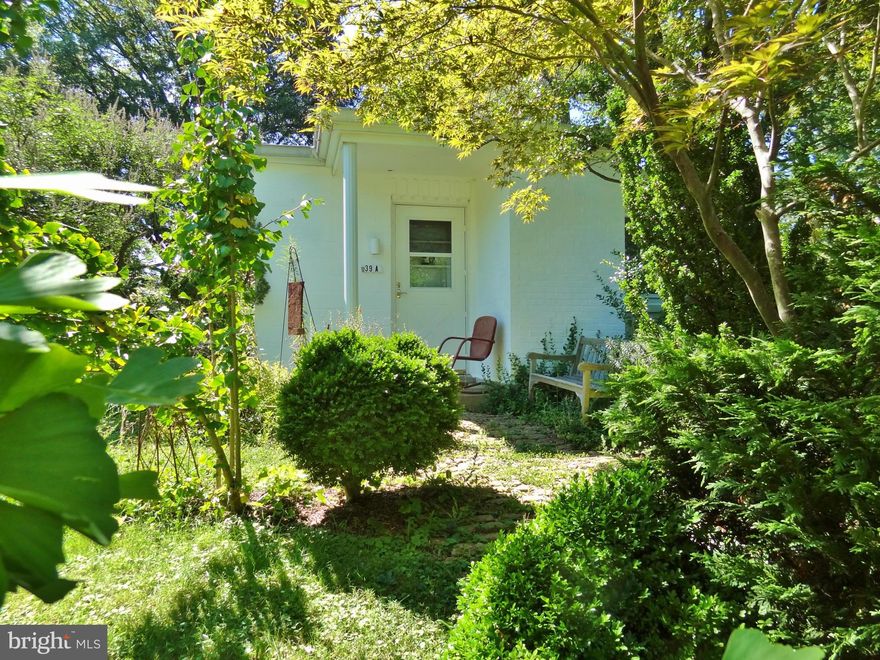 RARE GHI Honeymoon Cottage - only 16 out of 1,600.  Extensive landscaping with private garden area and unique plantings.  Remodeled throughout with fresh paint and carpet.  Walking distance to Roosevelt Center.  Garage space currently available.  Fee includes TAXES, insurance, trash pickup & most structural maintenance.  Adjacent to park & woodlands!  Please note - County Tax Record not accurate.