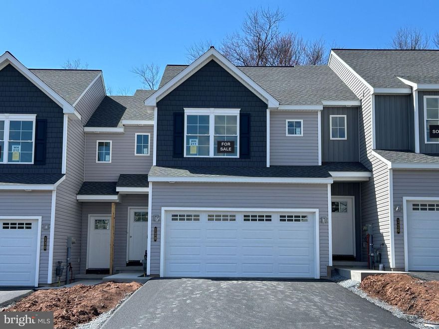 UNDER CONSTRUCTION. *$10,000 builder incentive; thru 4/30/26* 
This Bluebird model is a 3 BD, 2.5 BA, center unit townhome. You’ll soon discover the value of the many included features that are packed into this home. The open first floor plan will make entertaining family and friends a pleasure. Nine foot first floor walls make this home feel even more spacious. A self-cleaning electric range, granite counters and soft-close cabinet doors/drawers are featured in this kitchen. You will love all the storage available in the walk-in pantry. The entire first floor has luxury vinyl plank flooring. Check out the size of these bedrooms! The owner’s suite is sure to please with large spaces and lots of natural light. Bedrooms 2 and 3 have their own full bath. The laundry room is just steps from all bedrooms and bathrooms. This home also boasts a walk-out lower level, 10×12 composite deck, and a 2 car garage.
- Interior photos are of a similar model.
- All taxes are estimated since this is new construction and has not yet been assessed.