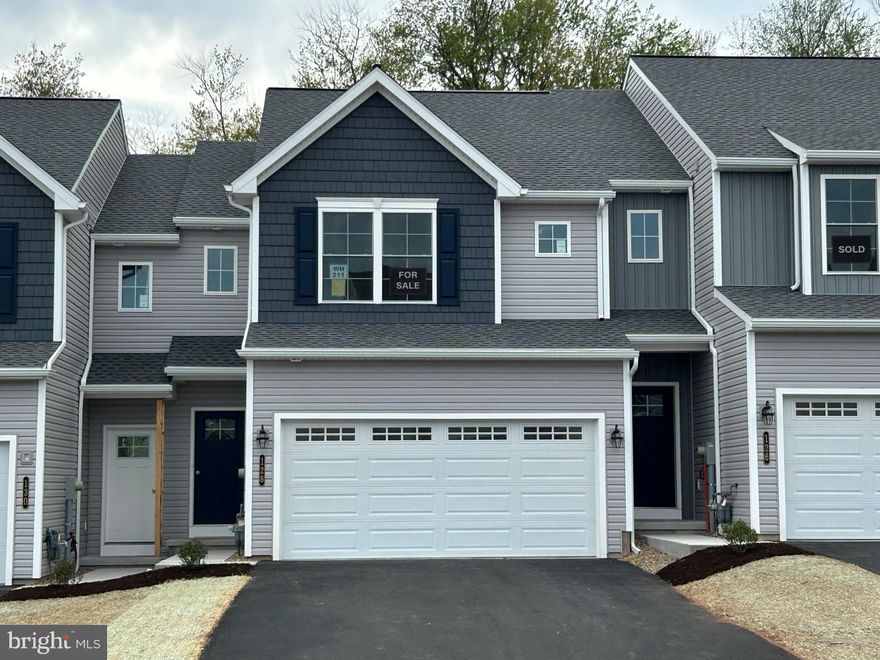 UNDER CONSTRUCTION. *$10,000 builder incentive; thru 4/30/26* 
This Bluebird model is a 3 BD, 2.5 BA, center unit townhome. You’ll soon discover the value of the many included features that are packed into this home. The open first floor plan will make entertaining family and friends a pleasure. Nine foot first floor walls make this home feel even more spacious. A self-cleaning electric range, granite counters and soft-close cabinet doors/drawers are featured in this kitchen. You will love all the storage available in the walk-in pantry. The entire first floor has luxury vinyl plank flooring. Check out the size of these bedrooms! The owner’s suite is sure to please with large spaces and lots of natural light. Bedrooms 2 and 3 have their own full bath. The laundry room is just steps from all bedrooms and bathrooms. This home also boasts a walk-out lower level, 10×12 composite deck, and a 2 car garage.
- Interior photos are of a similar model.
- All taxes are estimated since this is new construction and has not yet been assessed.