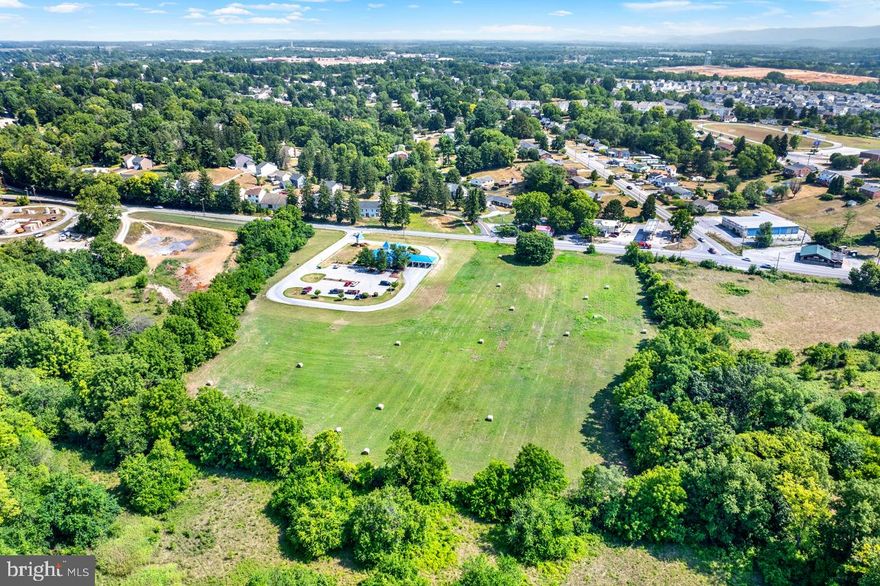 Unlock the potential of your business with this exceptional 6.33-acre commercial land lot in the heart of Charles Town, West Virginia. Strategically located with easy access to Route 340, this prime property offers unparalleled visibility and convenience, making it an ideal investment for a wide range of commercial ventures.

This versatile and open land is zoned for commercial use, suitable for a variety of business applications. Its central location in Charles Town ensures high visibility and exposure, with a high traffic count that guarantees excellent exposure for your business. The convenient access to Route 340, a major thoroughfare, adds to its appeal, making it perfect for retail, office space, hospitality, or mixed-use development.

Seize this unique opportunity to establish your business in a thriving area with robust growth potential. Whether you're looking to expand your current operations or embark on a new venture, this property offers the perfect canvas to realize your vision.